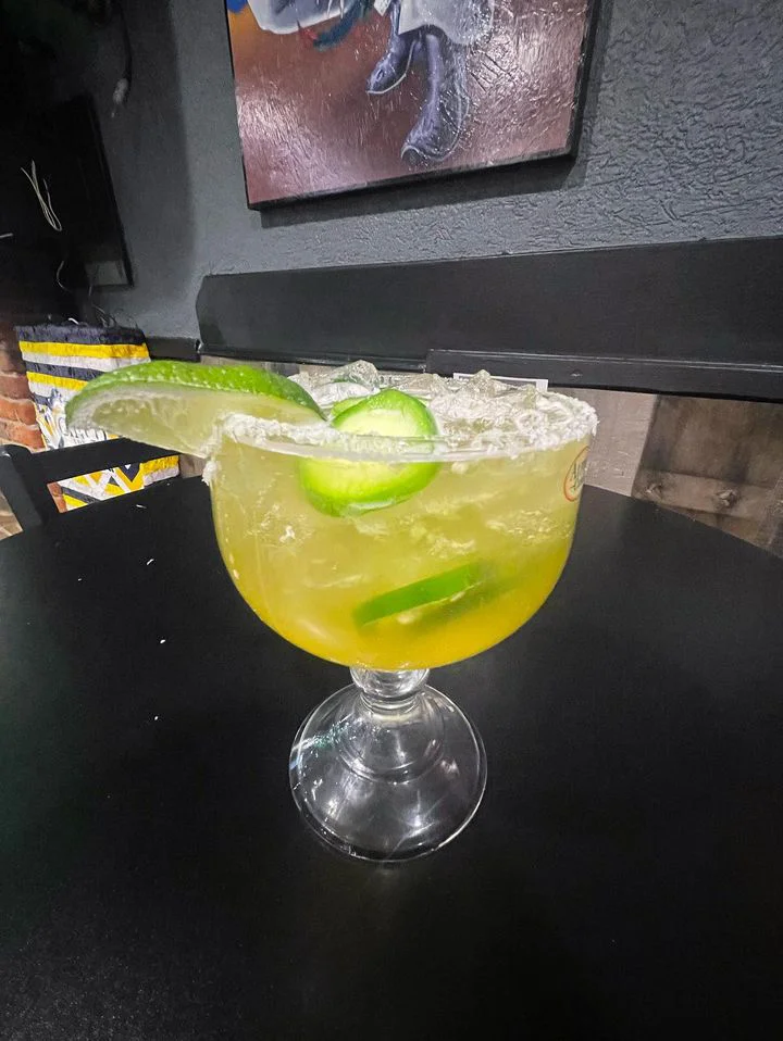 Refreshing margarita cocktail with lime and cucumber