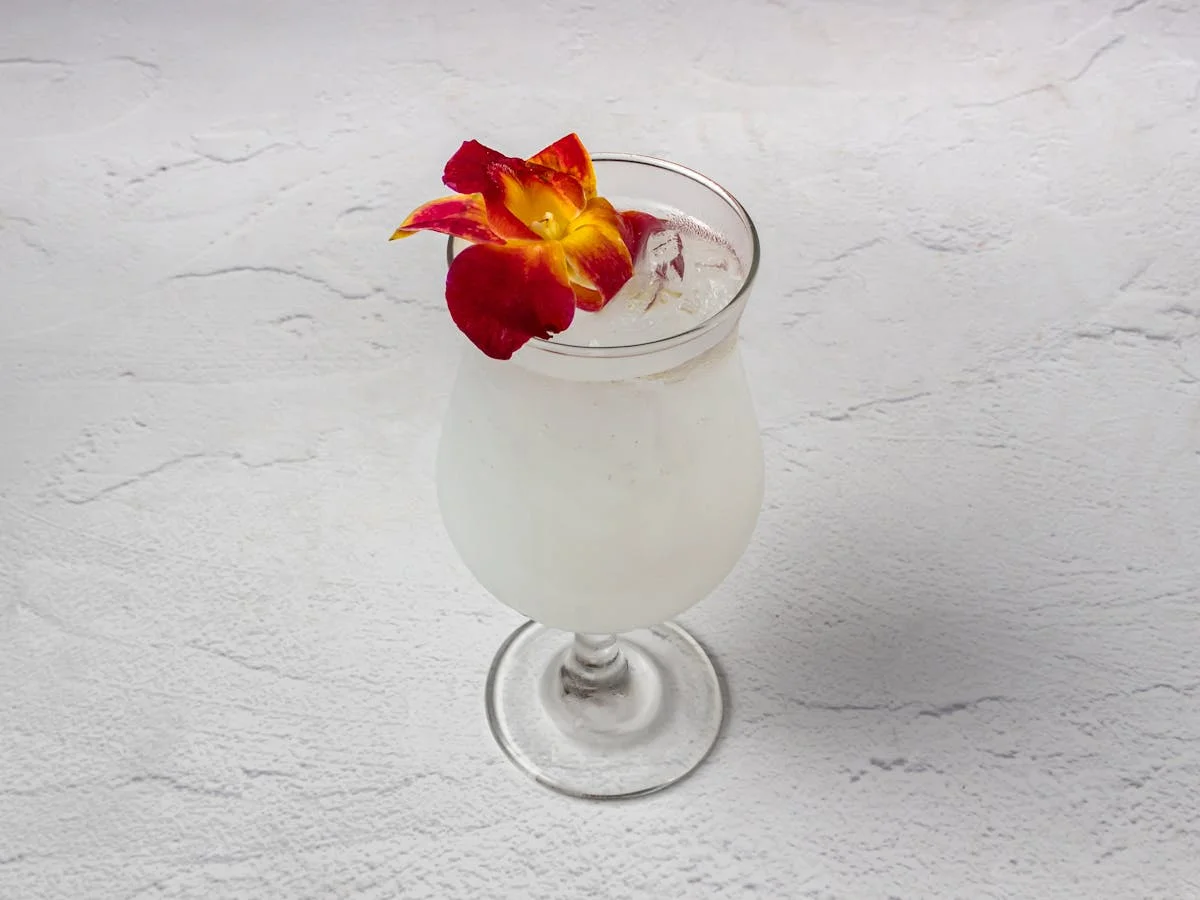 Signature cocktail at Amici Brick Oven Pizza — full bar and Italian wine list in West Palm Beach