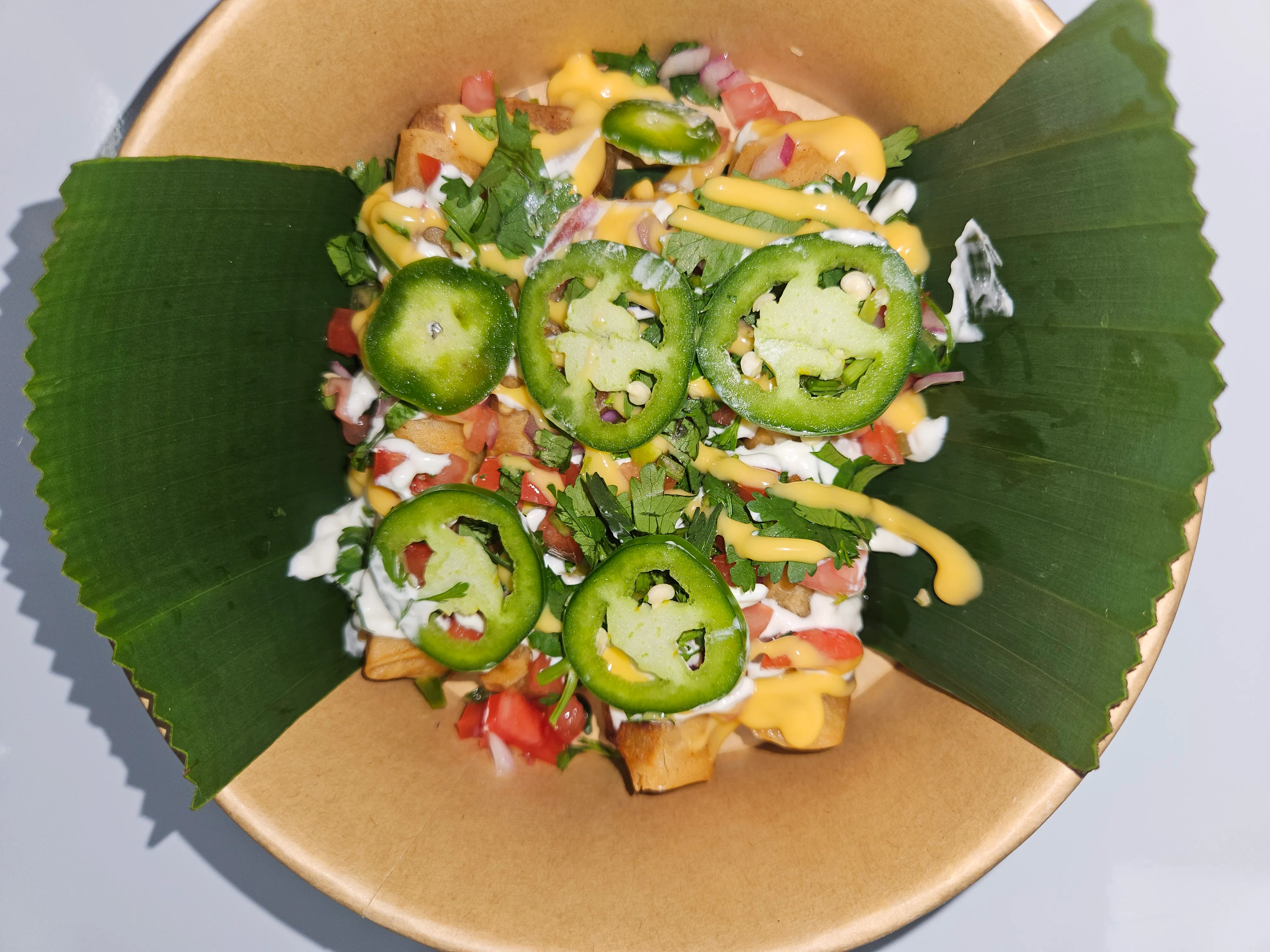 Loaded nachos with jalapeños and cheese