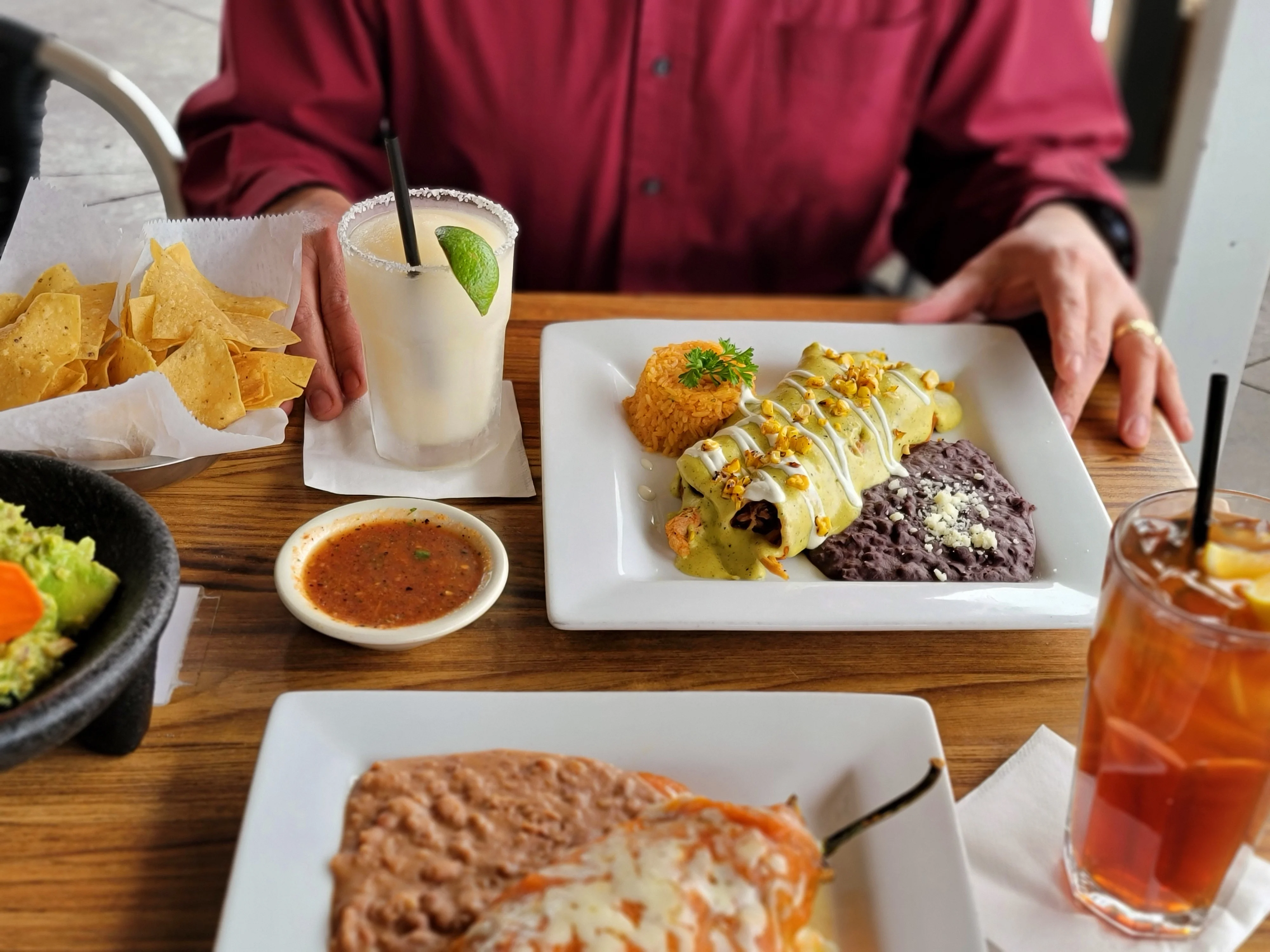 Delicious Mexican enchiladas with rice and beans