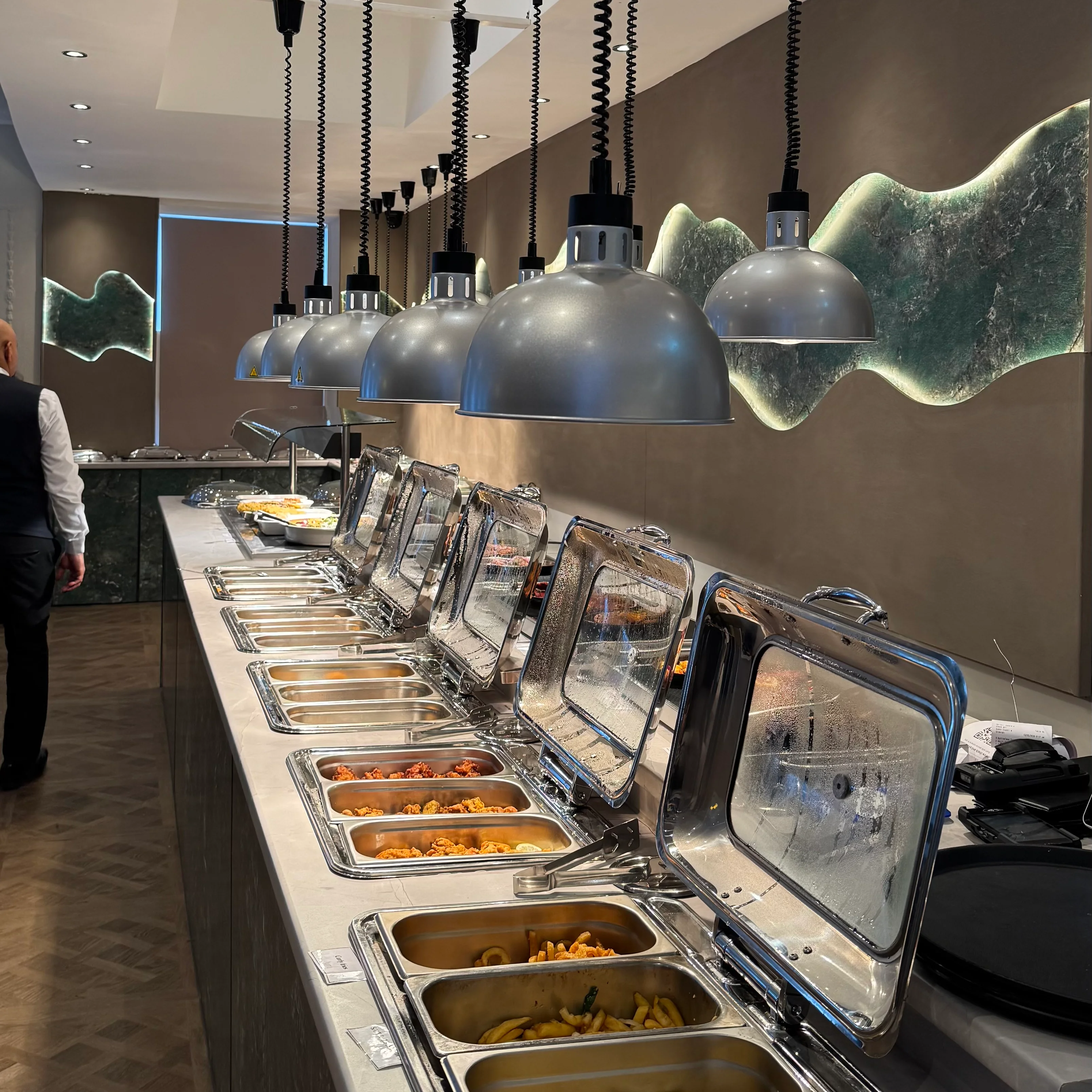 A restaurant chef preparing a dish
