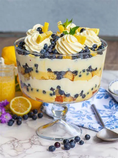 Lemon blueberry trifle in a glass bowl