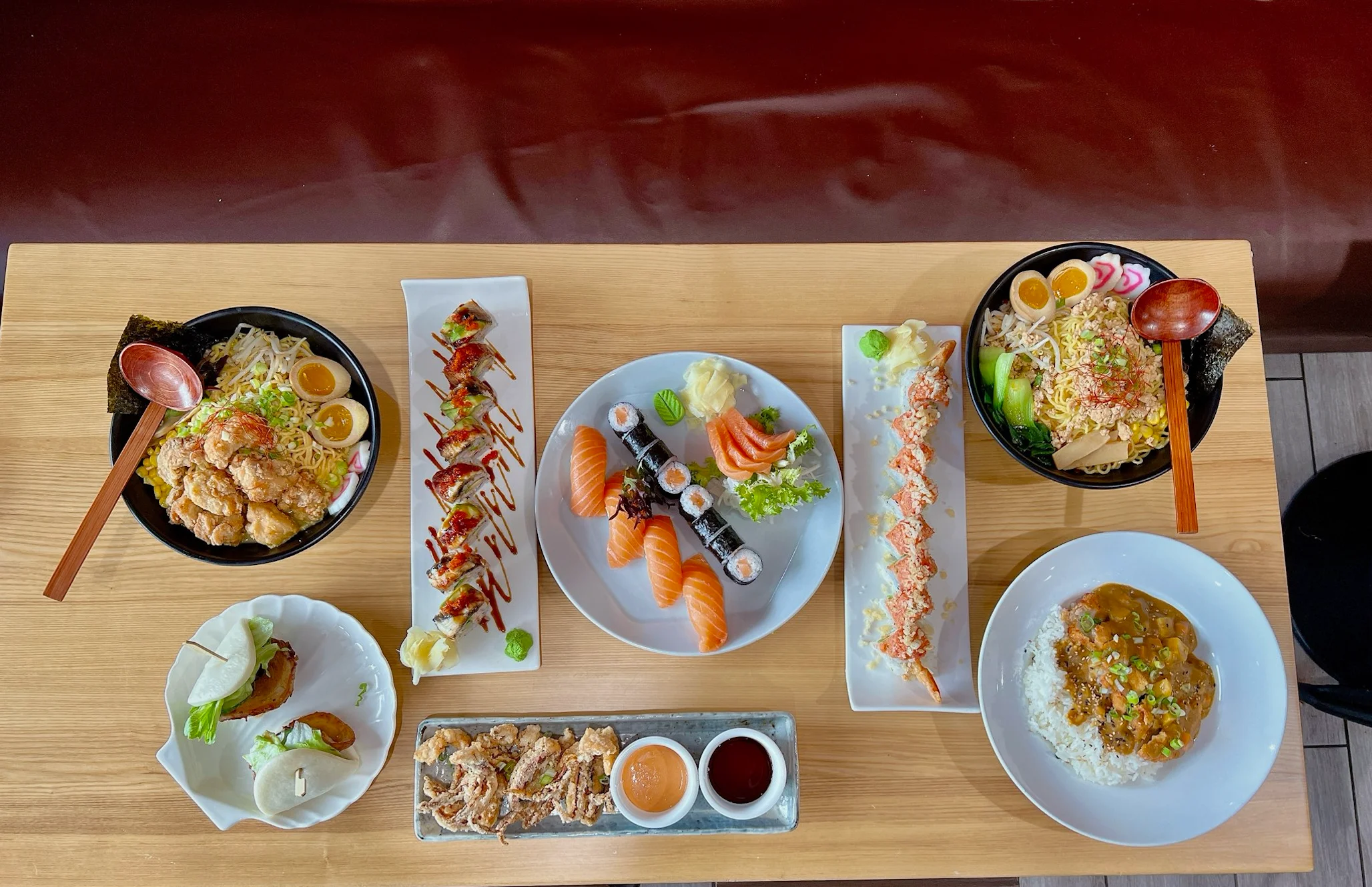 Assorted Japanese dishes including sushi, ramen, and tempura