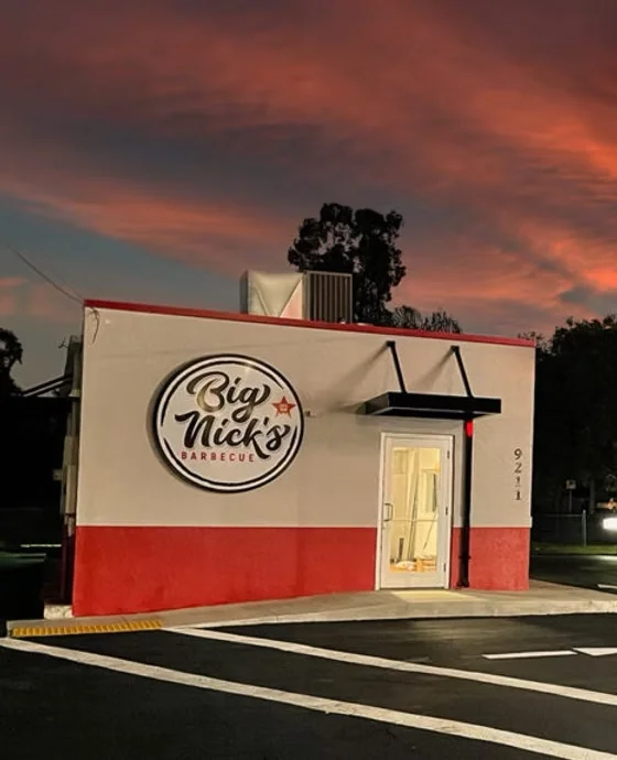 Exterior view of Big Nick's Barbecue restaurant at sunset