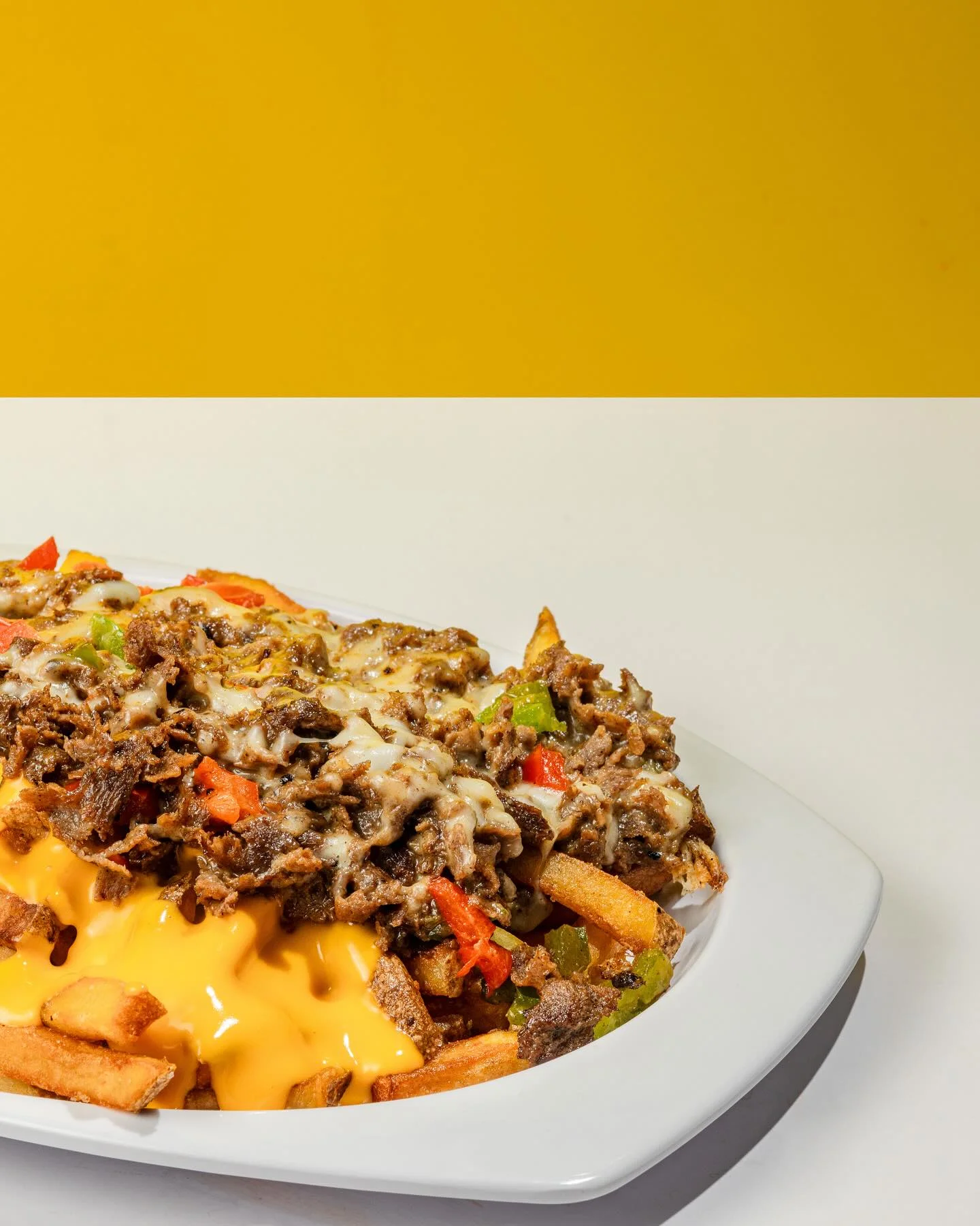Loaded cheese fries with beef and peppers