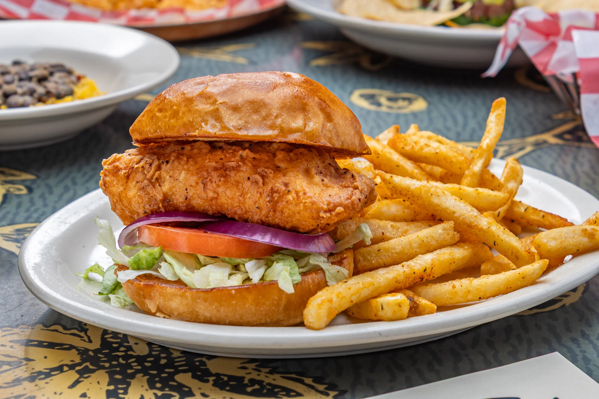 Crispy American fried chicken sandwich with seasoned fries