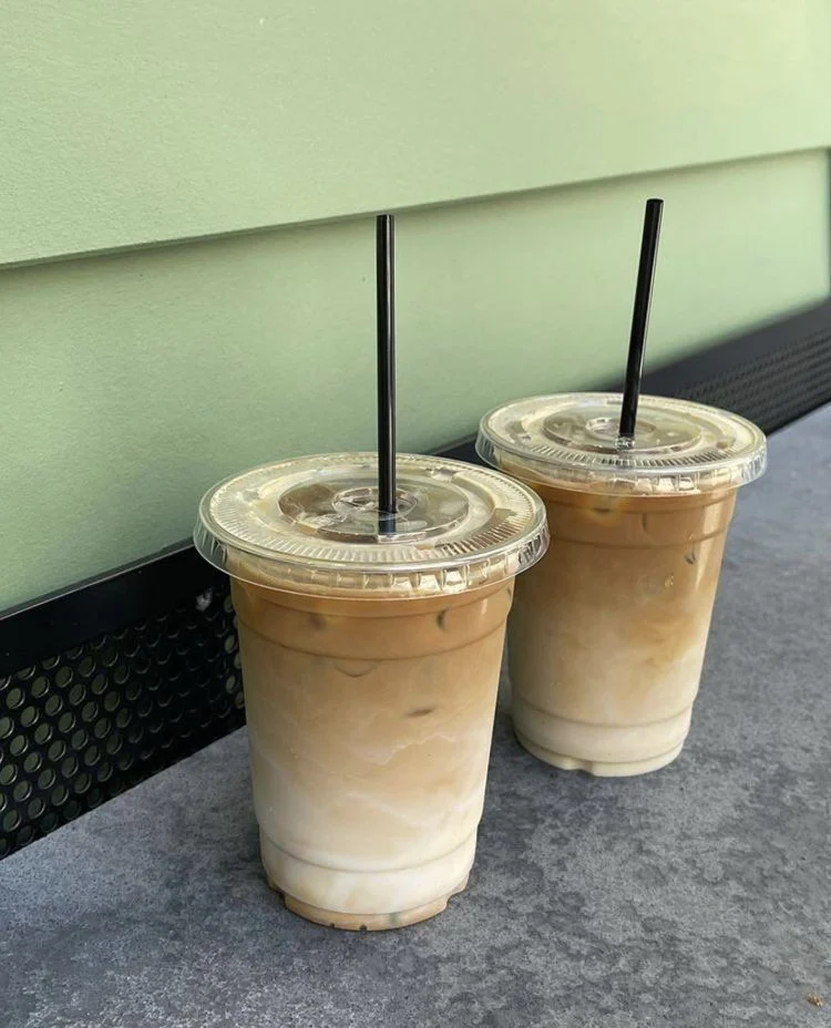 Iced coffee drinks with layered milk and espresso