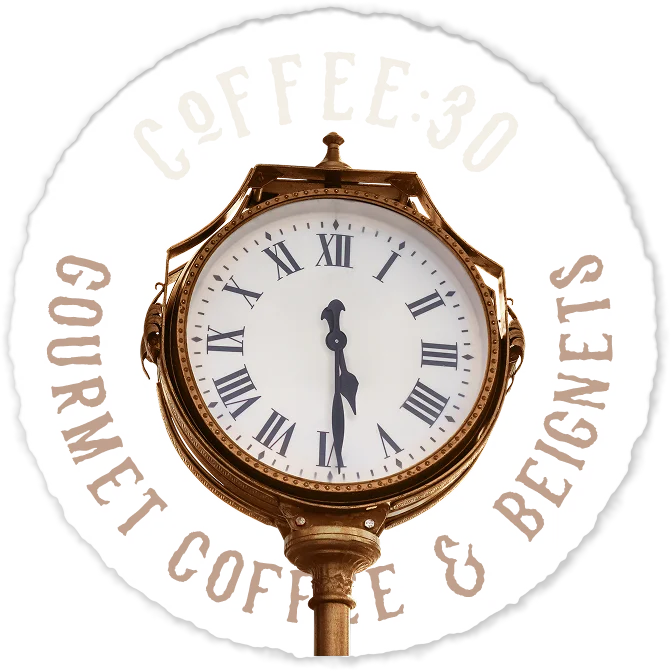 Vintage clock with restaurant branding for gourmet coffee and beignets