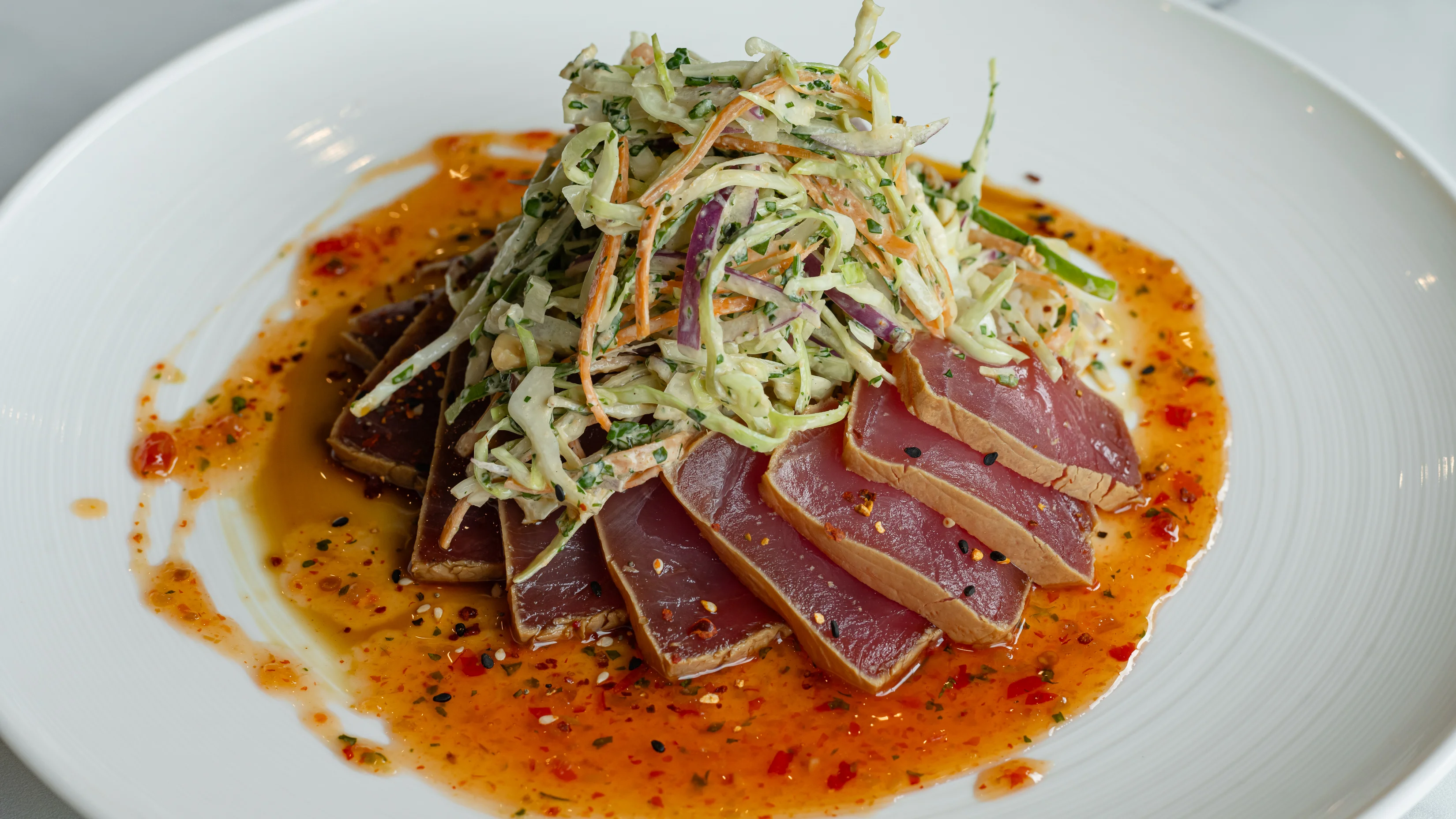 Seared tuna salad with Asian slaw and spicy sauce