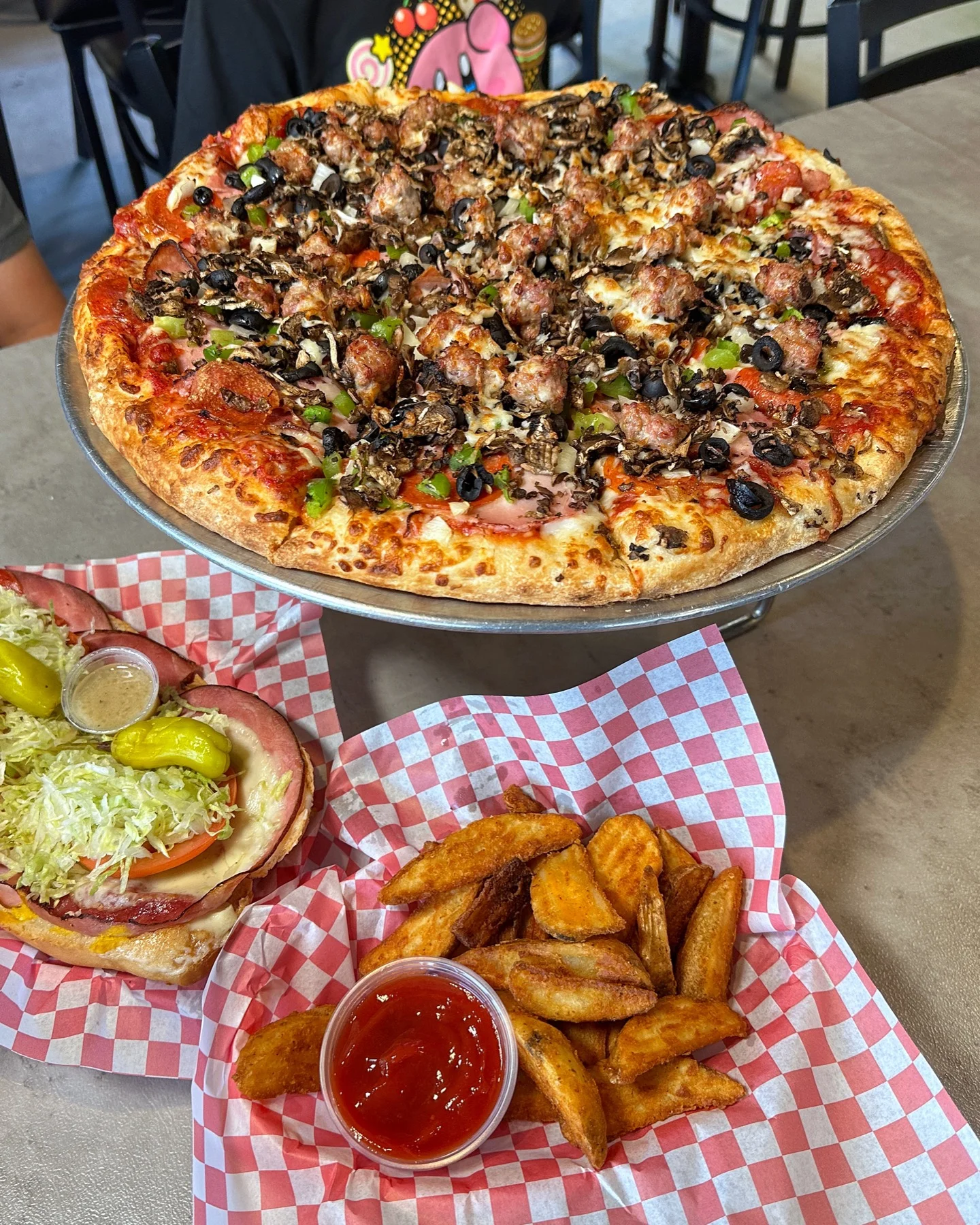 Pepz House Special pizza with salad and Pepz Potatoes at Stadium Pepz