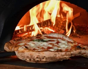 Margherita pizza fresh from a wood-fired oven
