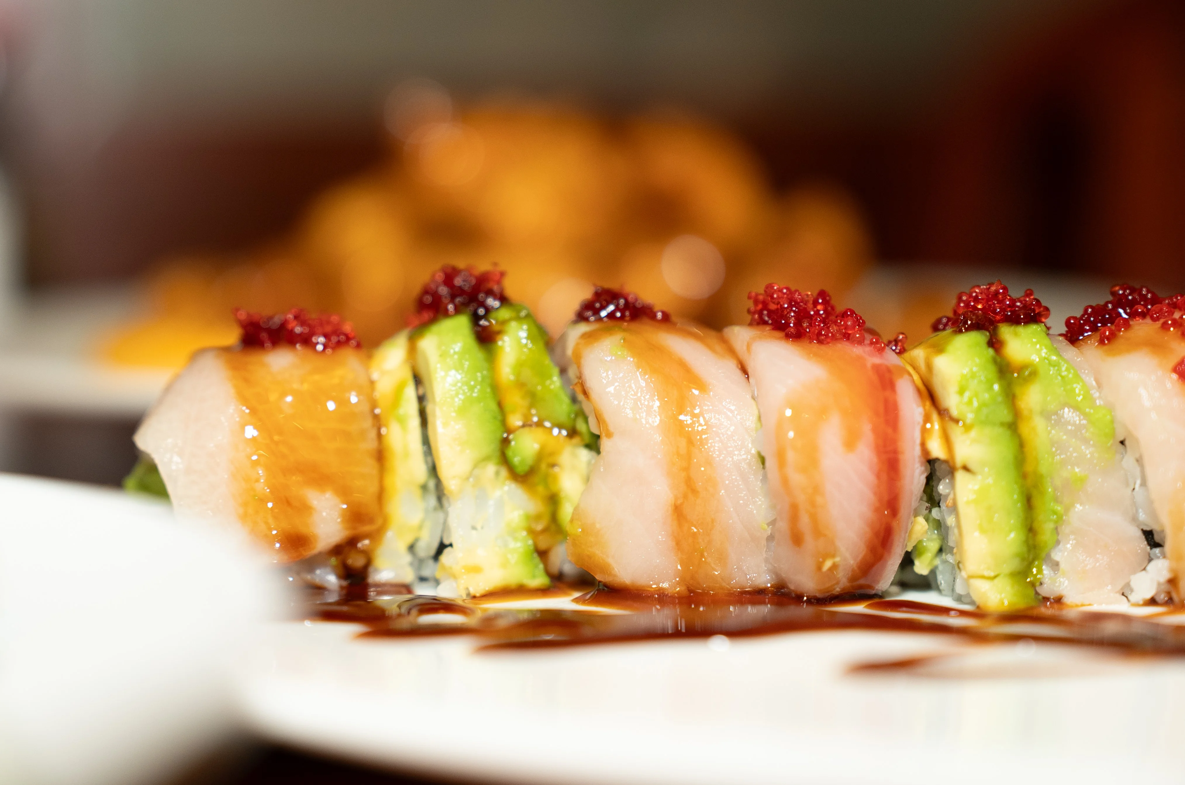 Japanese sushi roll with avocado and fish