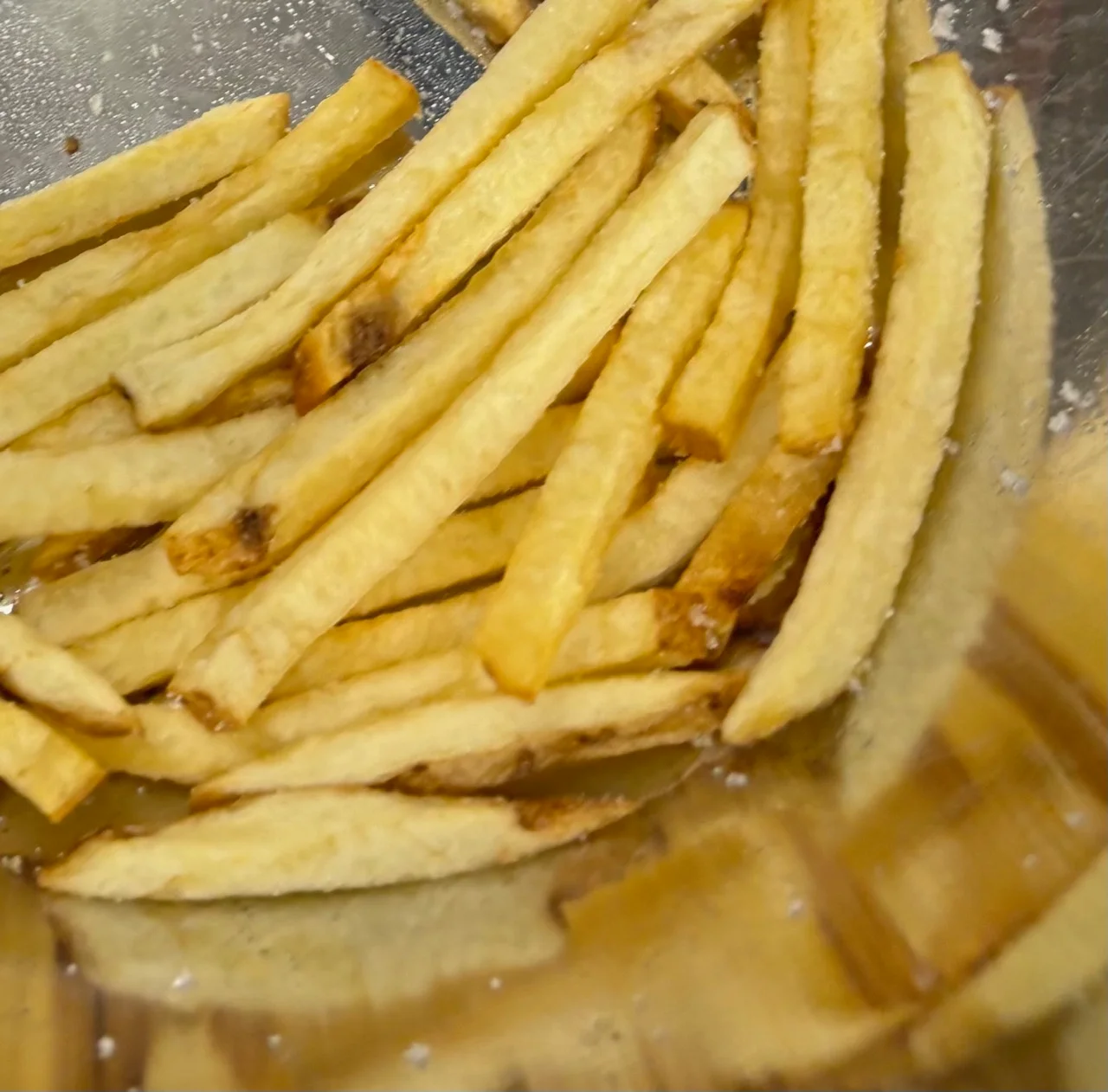 Crispy French fries served in a bowl