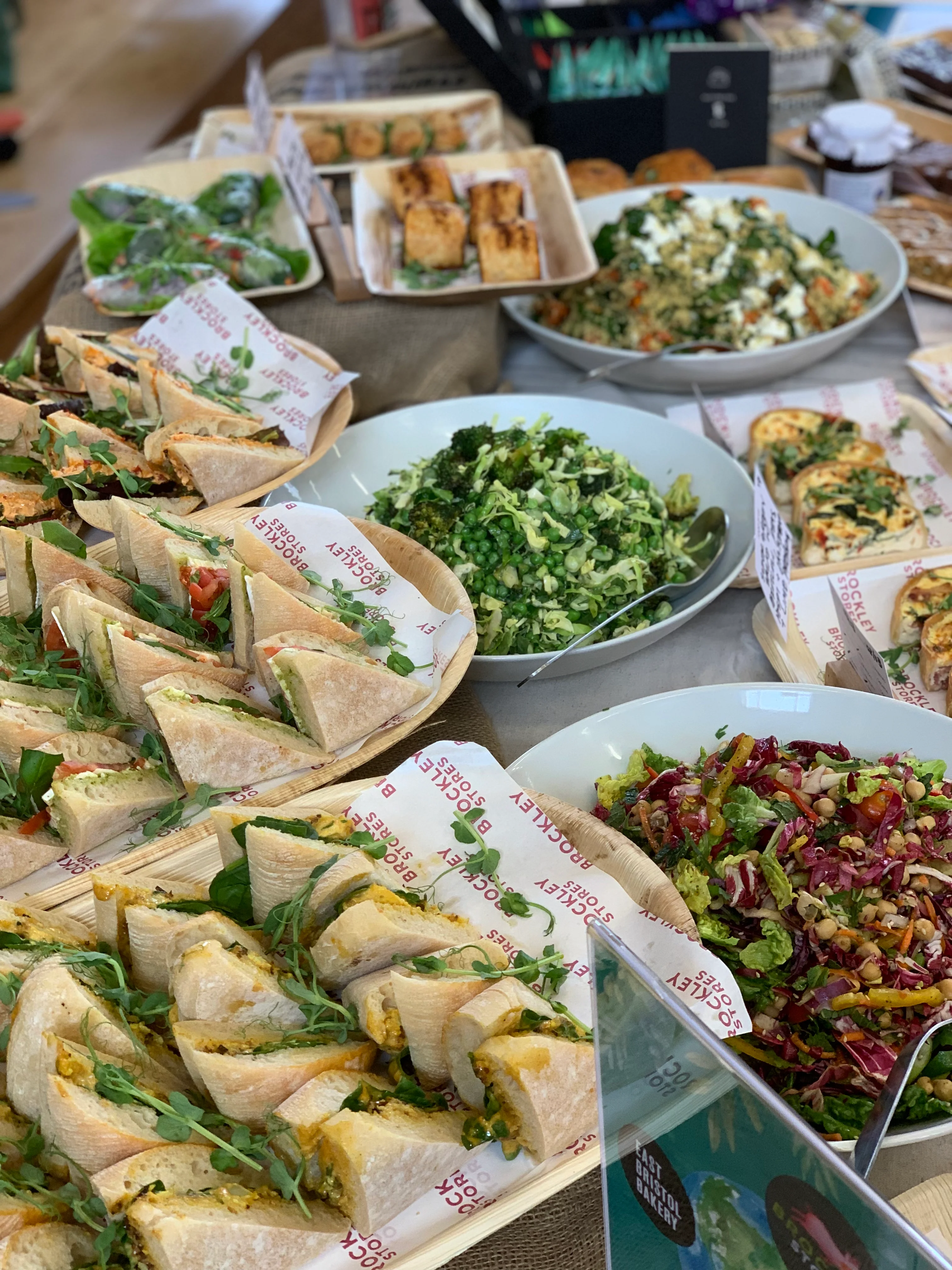 Assorted Mediterranean mezze platter with fresh salads and wraps