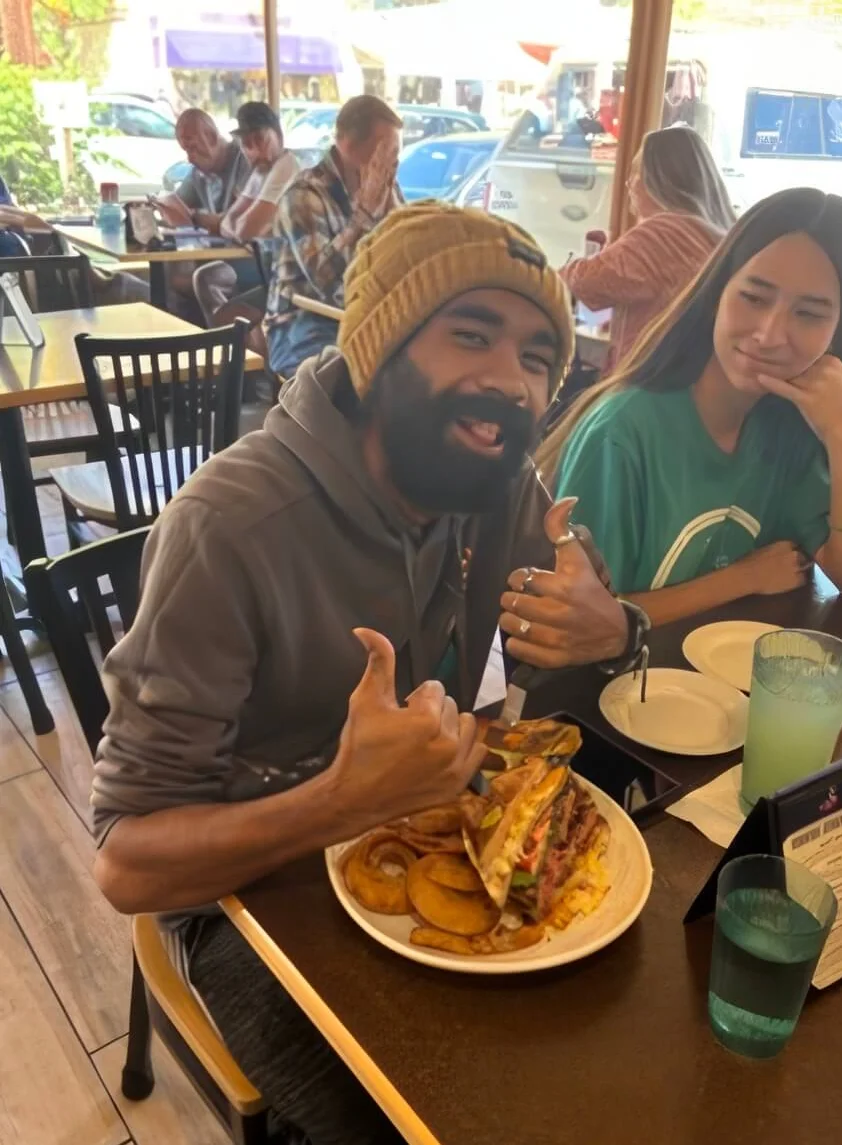Loaded burger with fries in a casual dining setting