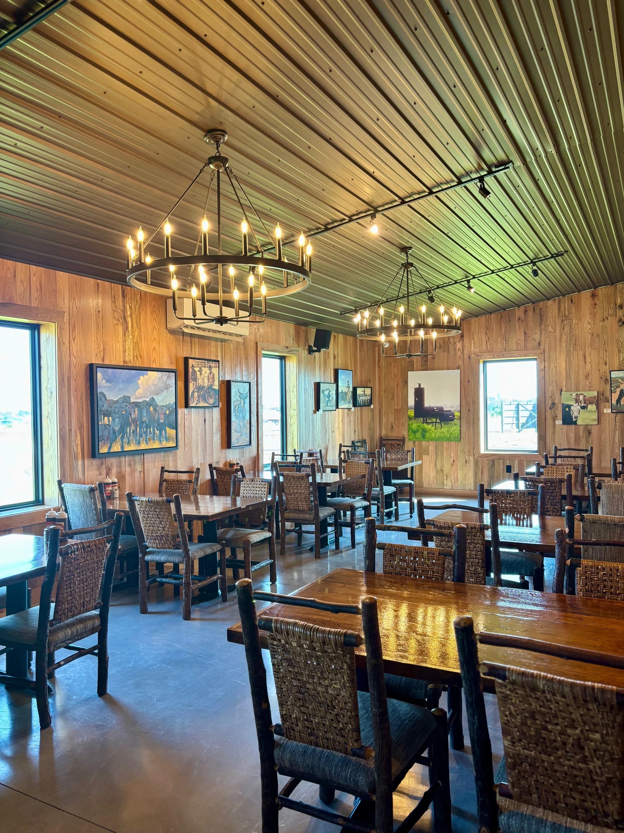Cozy restaurant interior with wooden decor and warm lighting