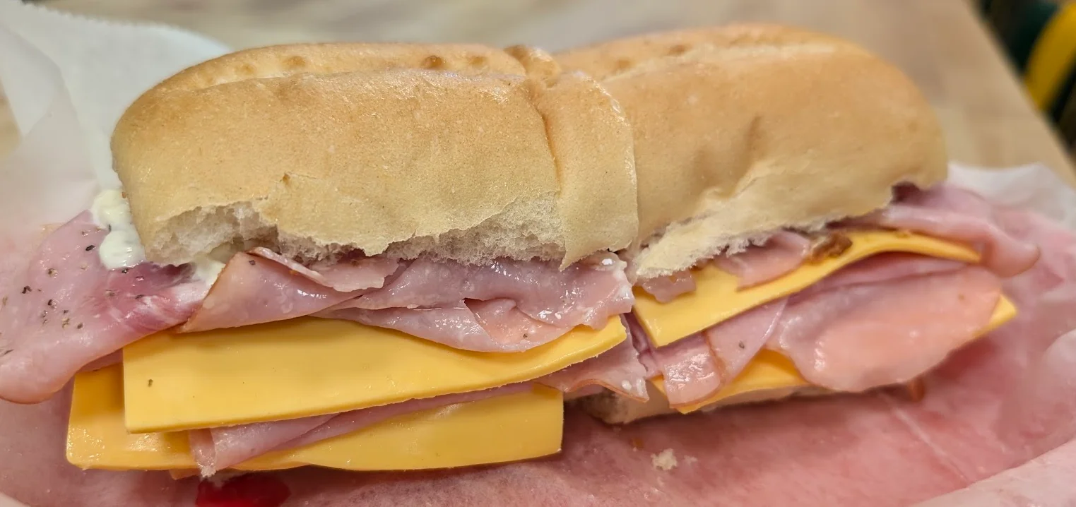 Classic deli sandwich with ham and cheddar cheese