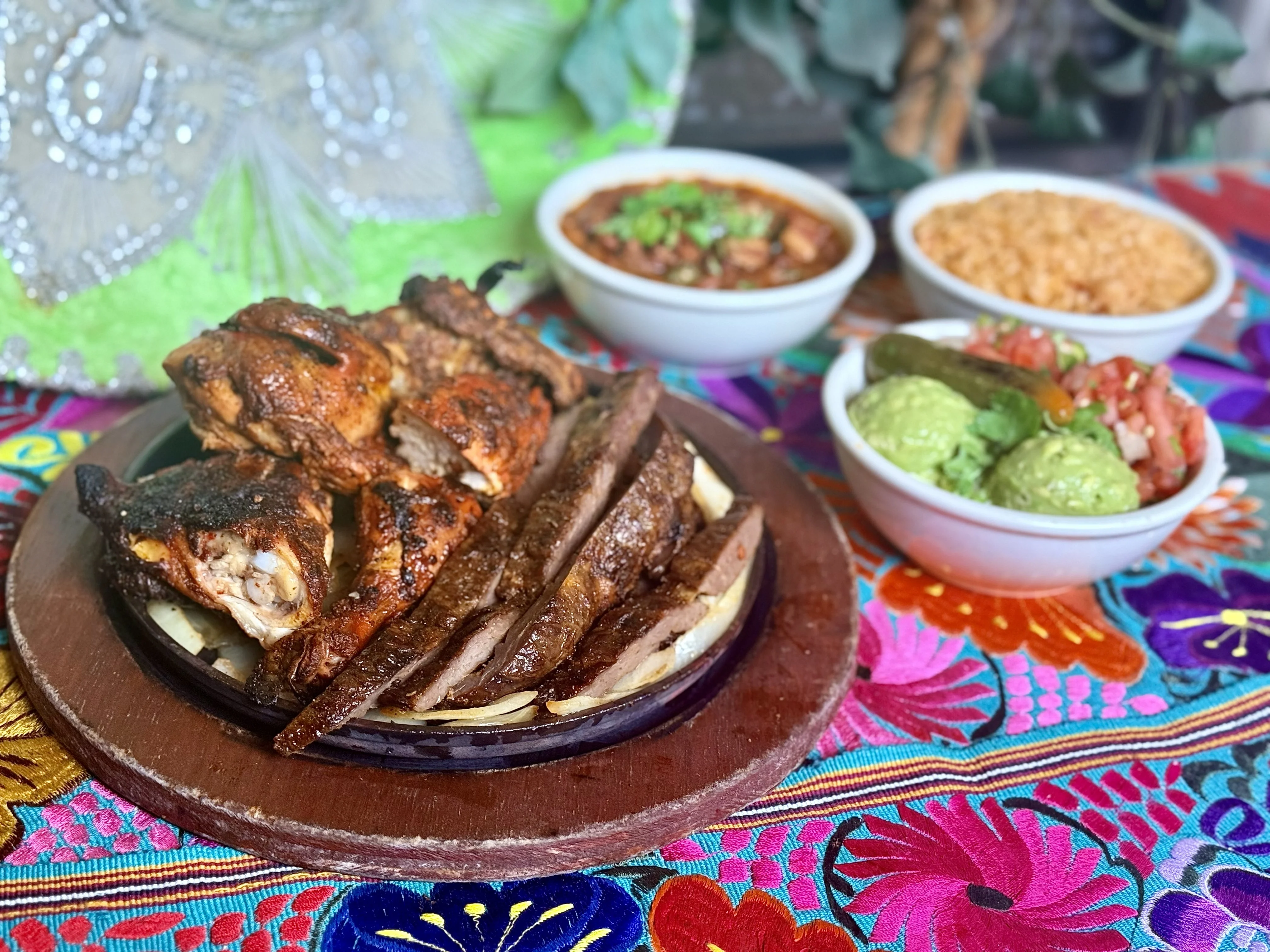 Sizzling Mexican fajitas with grilled chicken and sides