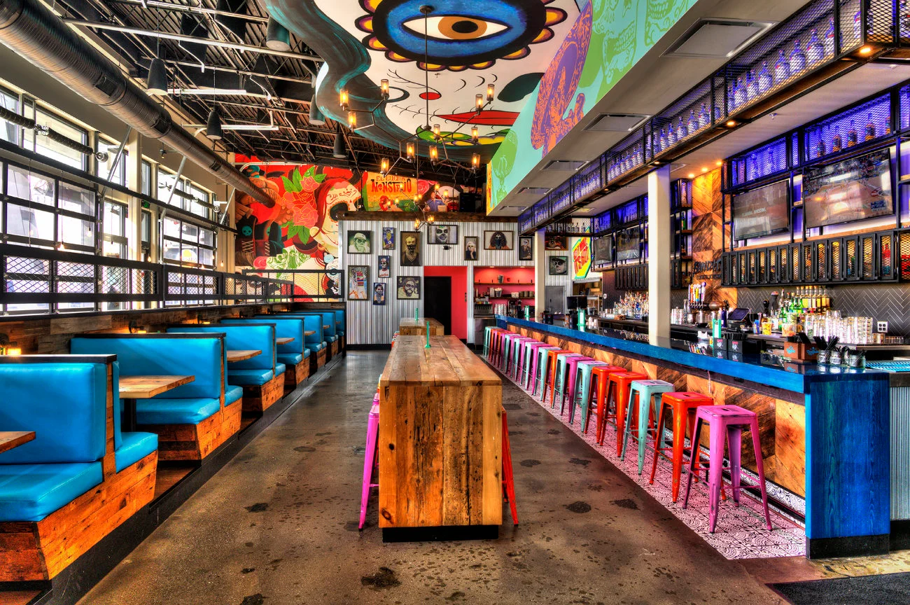 A vibrant bar scene at Banditos White Marsh with colorful drinks and lively atmosphere.