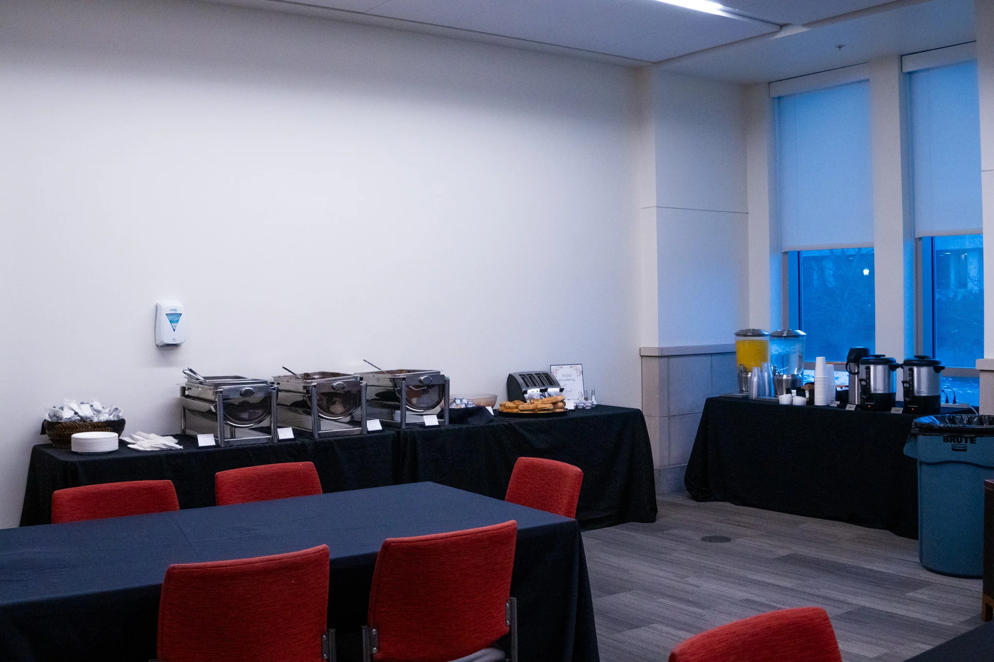 Catering setup with chafing dishes and beverage station