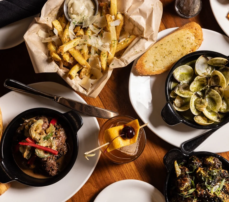 Gourmet seafood and steak dishes in a cozy restaurant setting