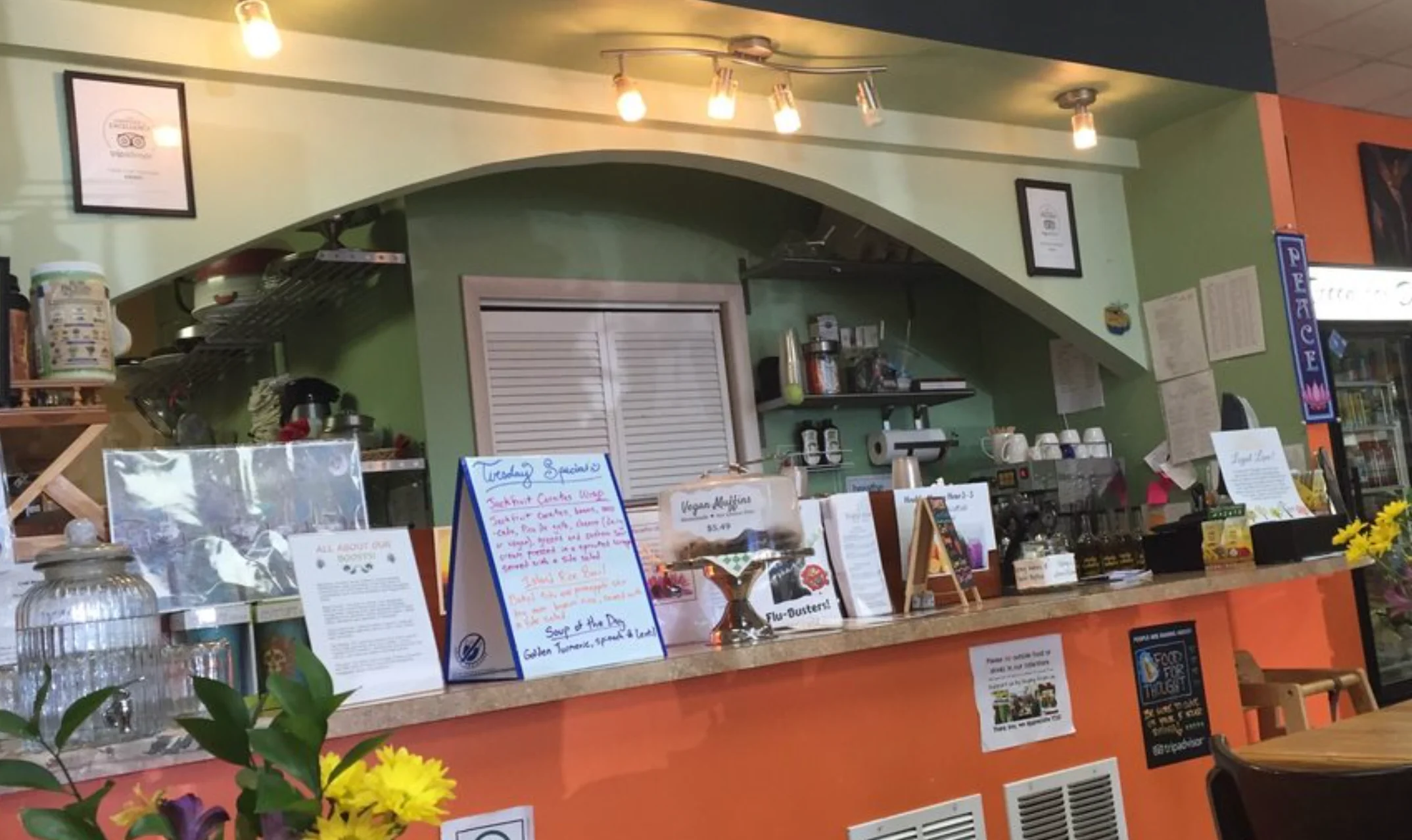 Cozy café interior with colorful decor and menu specials