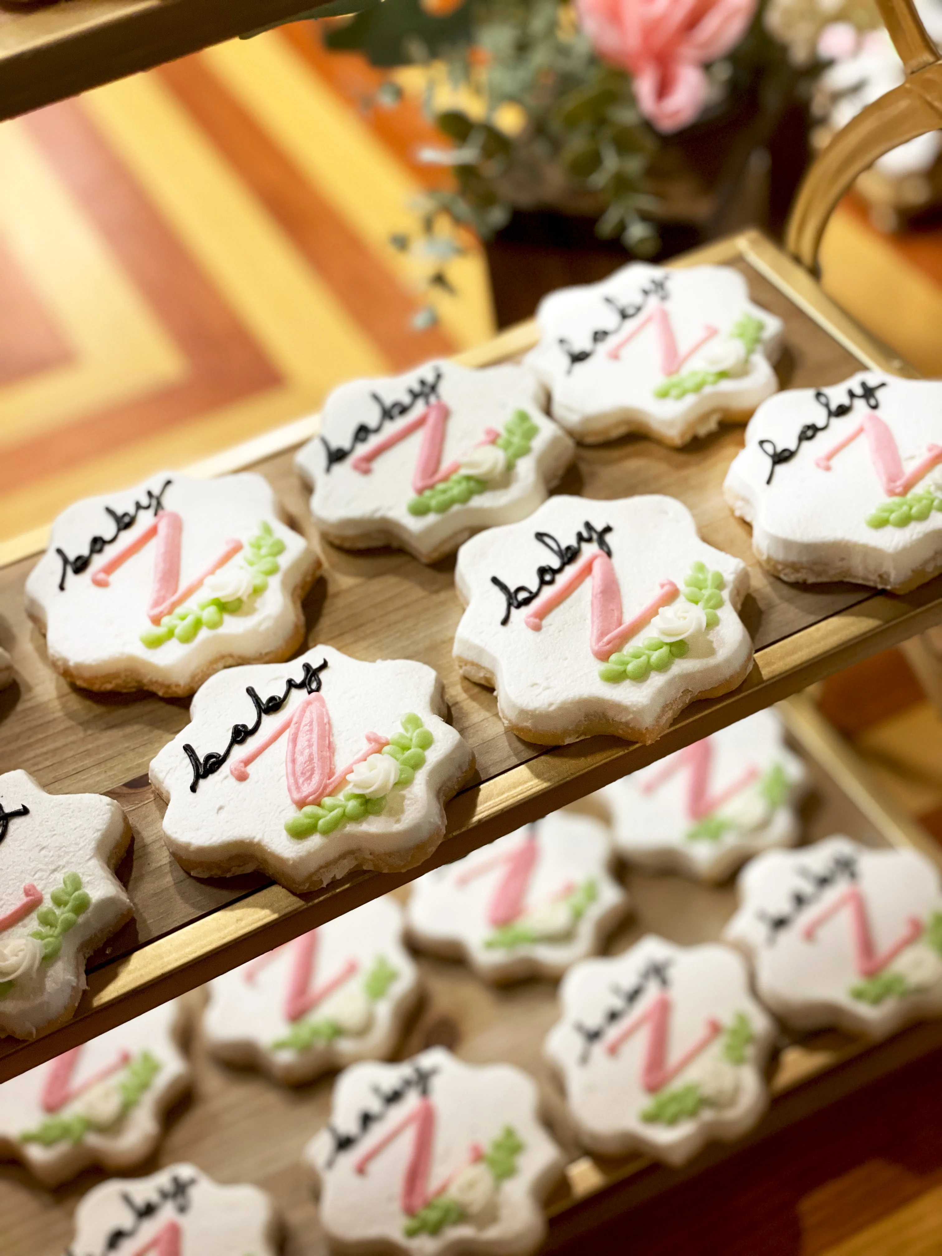 Decorative baby shower cookies with floral designs