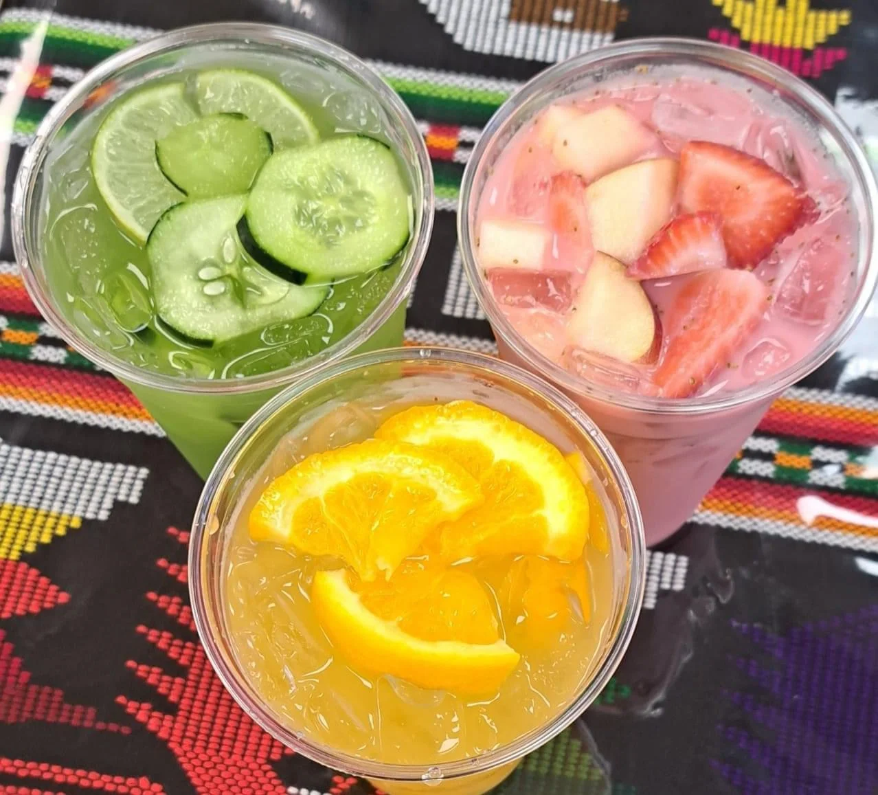 Refreshing Mexican aguas frescas in colorful cups