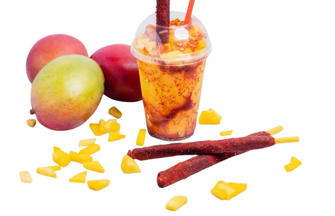Refreshing mango chamoy drink with fruit and candy