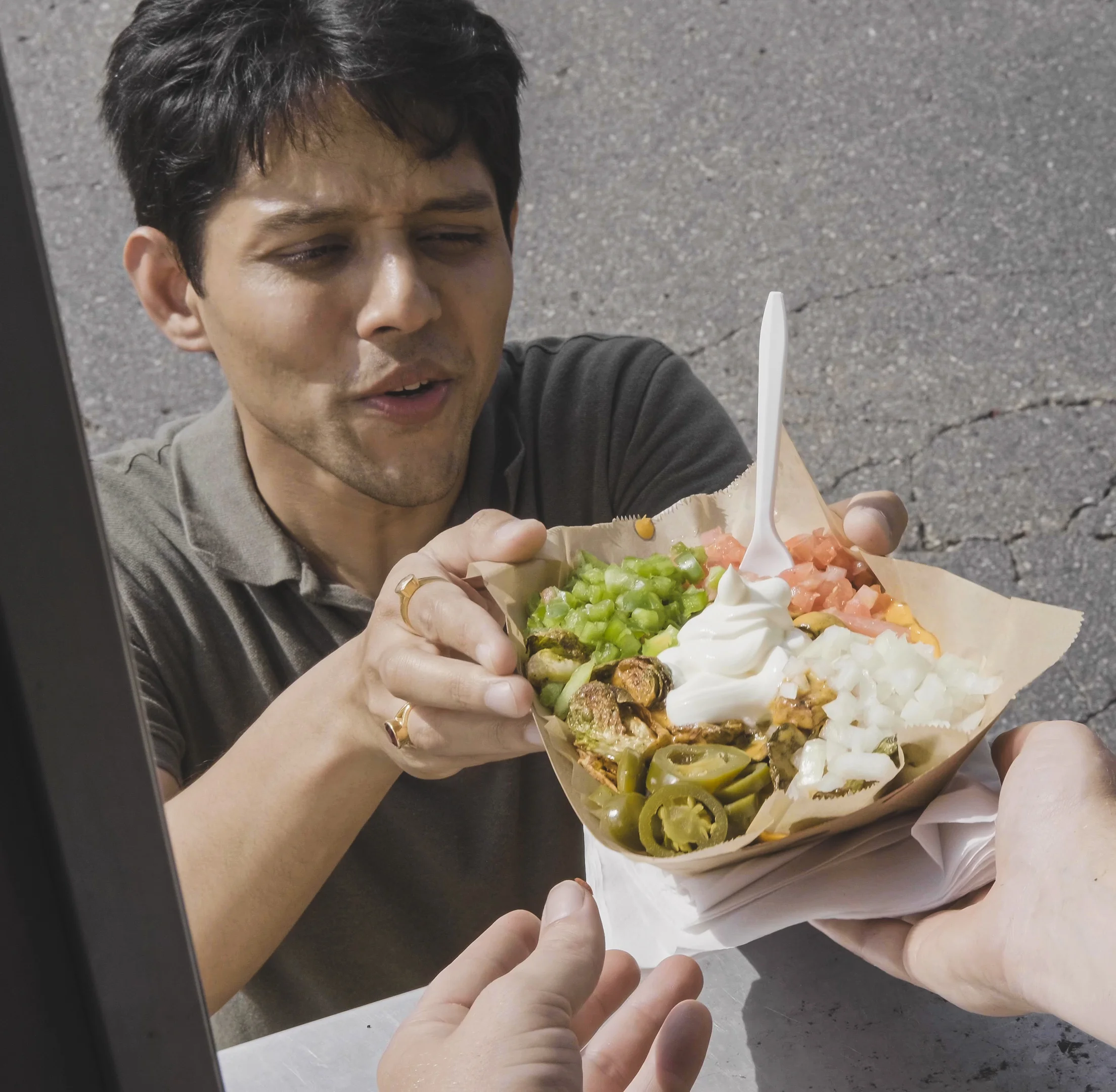 Customer receiving his meal overwhelmed with excitement
