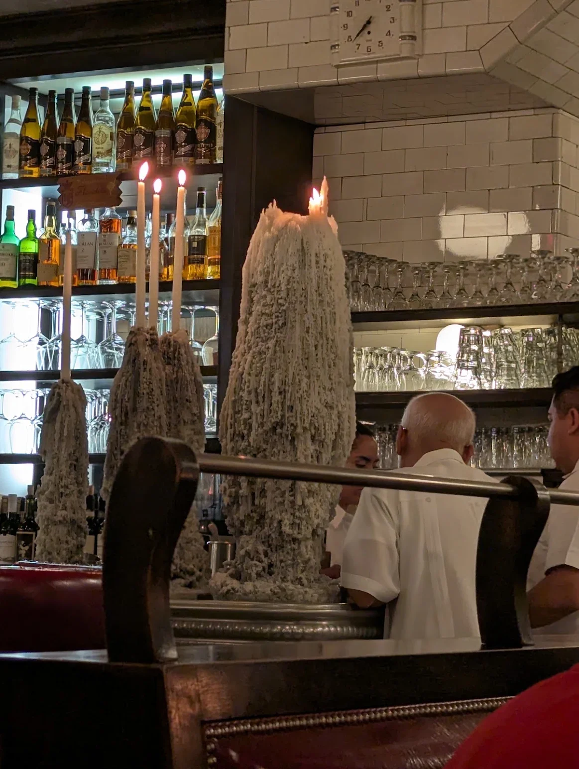 Unique candle display in a cozy restaurant setting