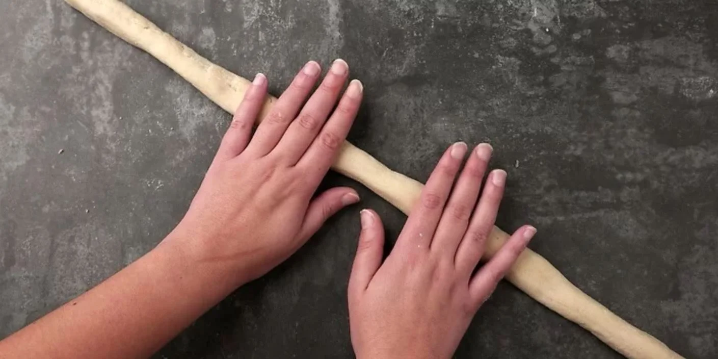 Rolling dough for traditional bread preparation