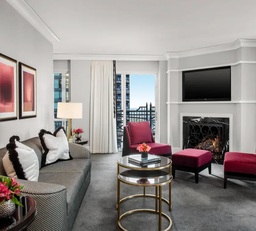 Elegant hotel suite with modern decor and city views