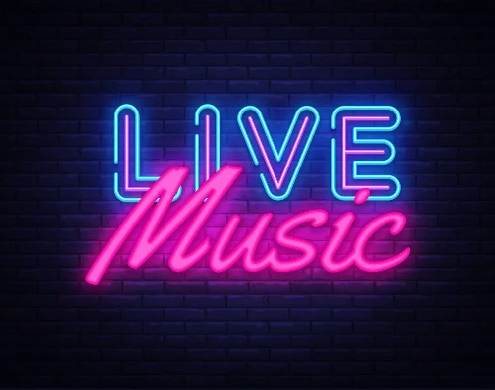 Neon sign displaying 'LIVE Music' in vibrant colors