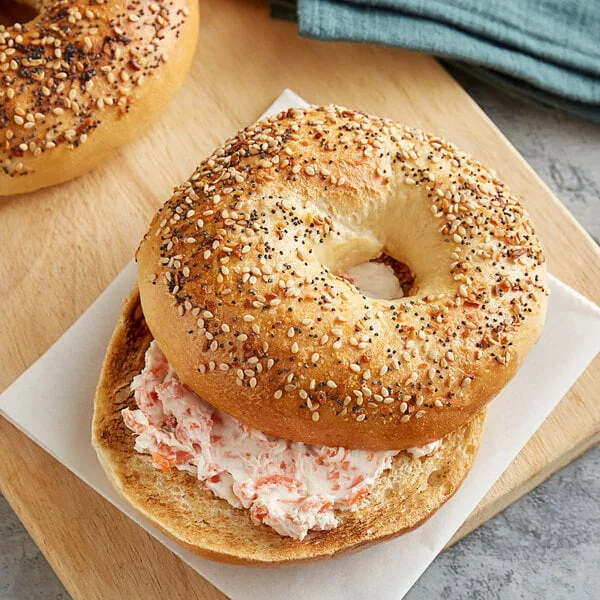 Bagel with cream cheese spread, a classic New York breakfast