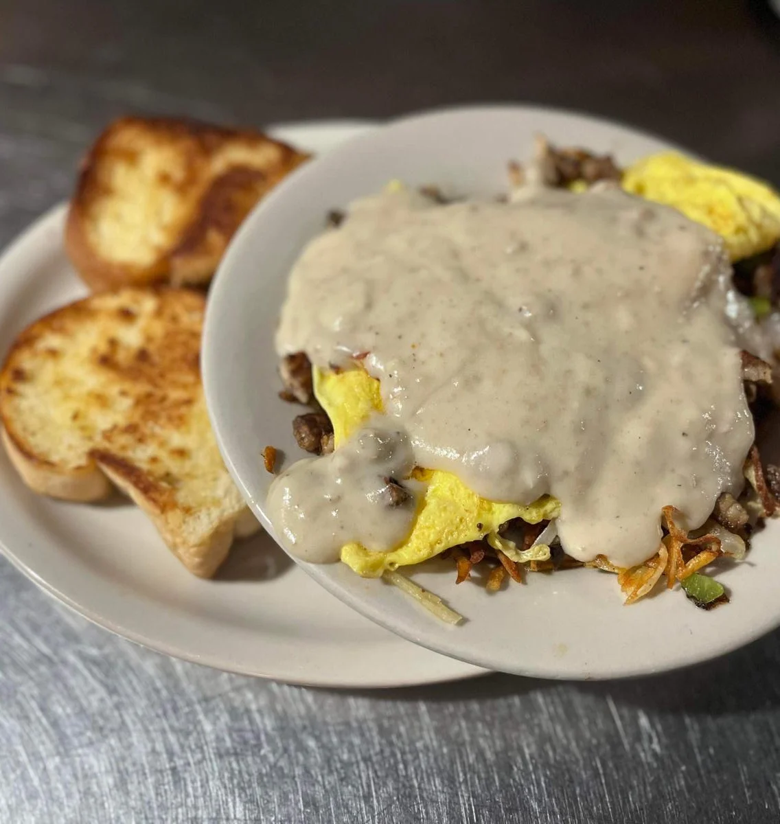 Southern-style biscuits and gravy with omelette and toast