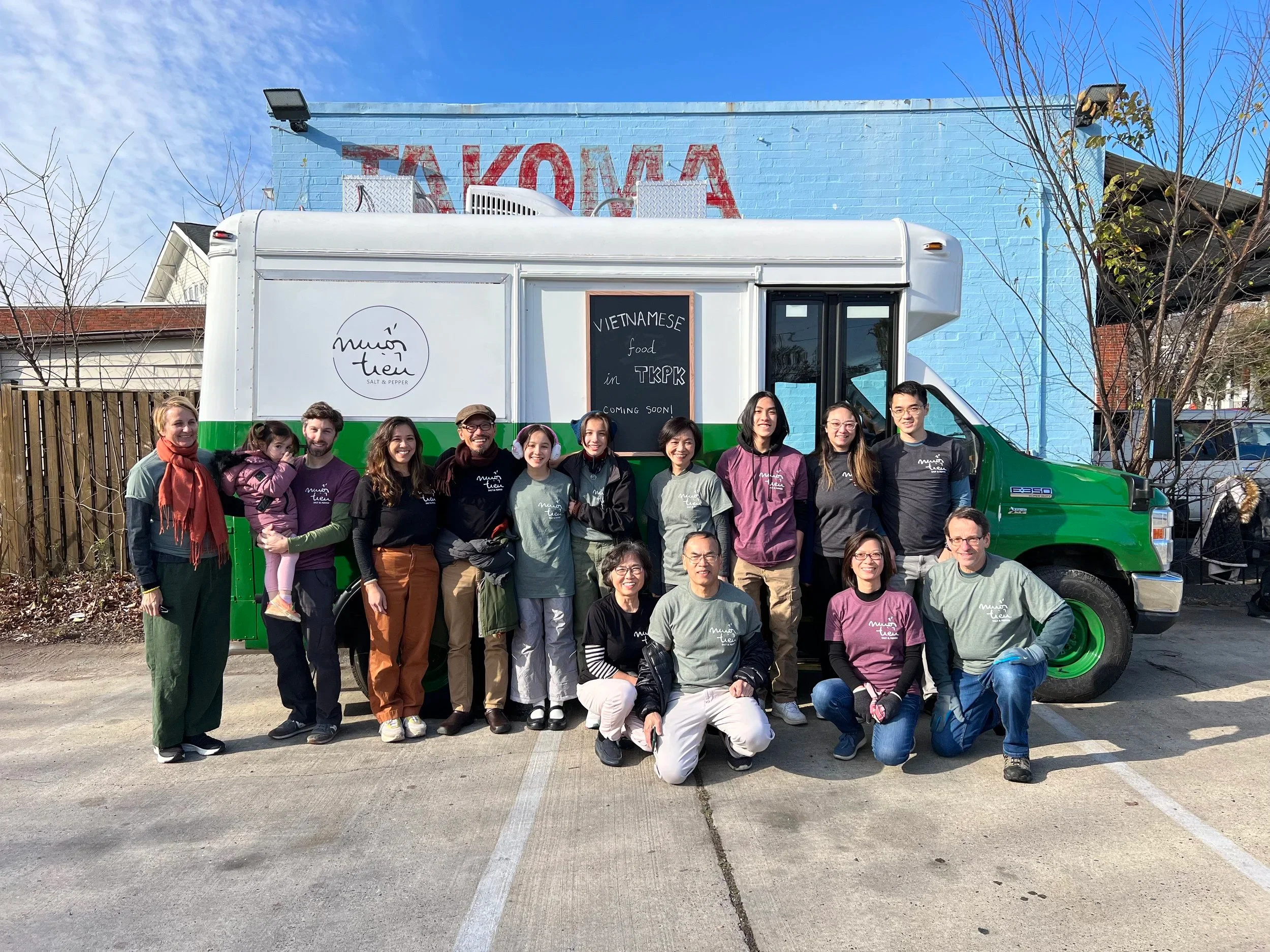 Team in front of a Vietnamese food truck