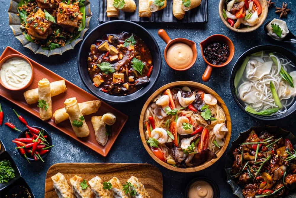 Assorted Asian dishes including stir-fry and dumplings