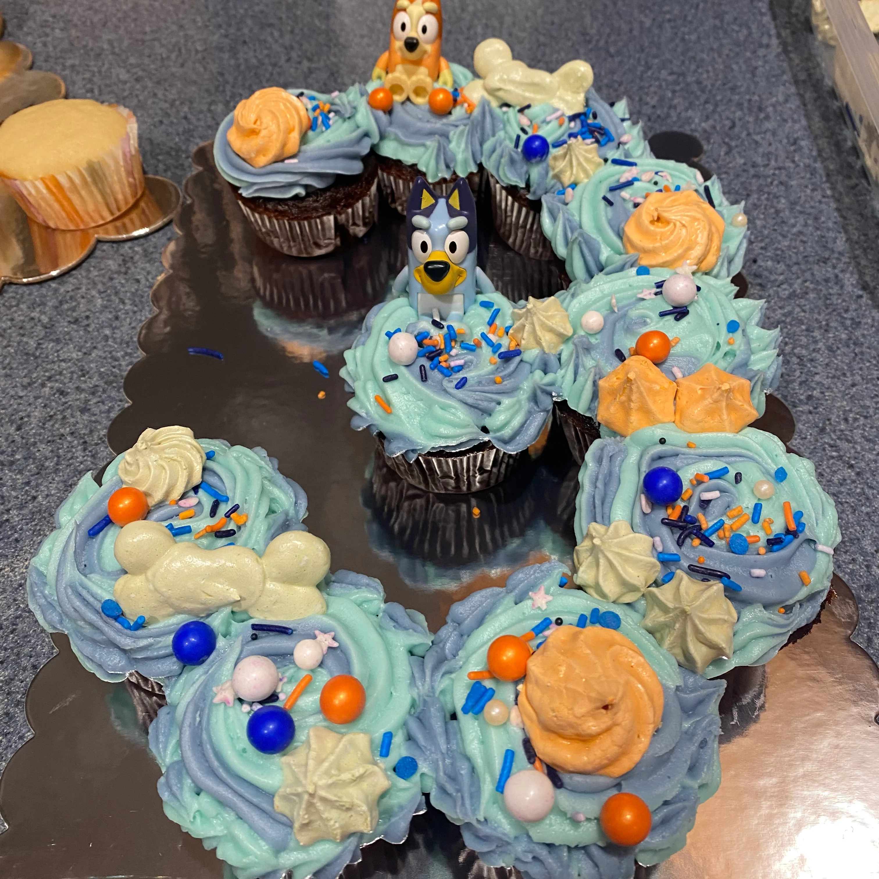 Colorful cupcakes decorated for a birthday celebration