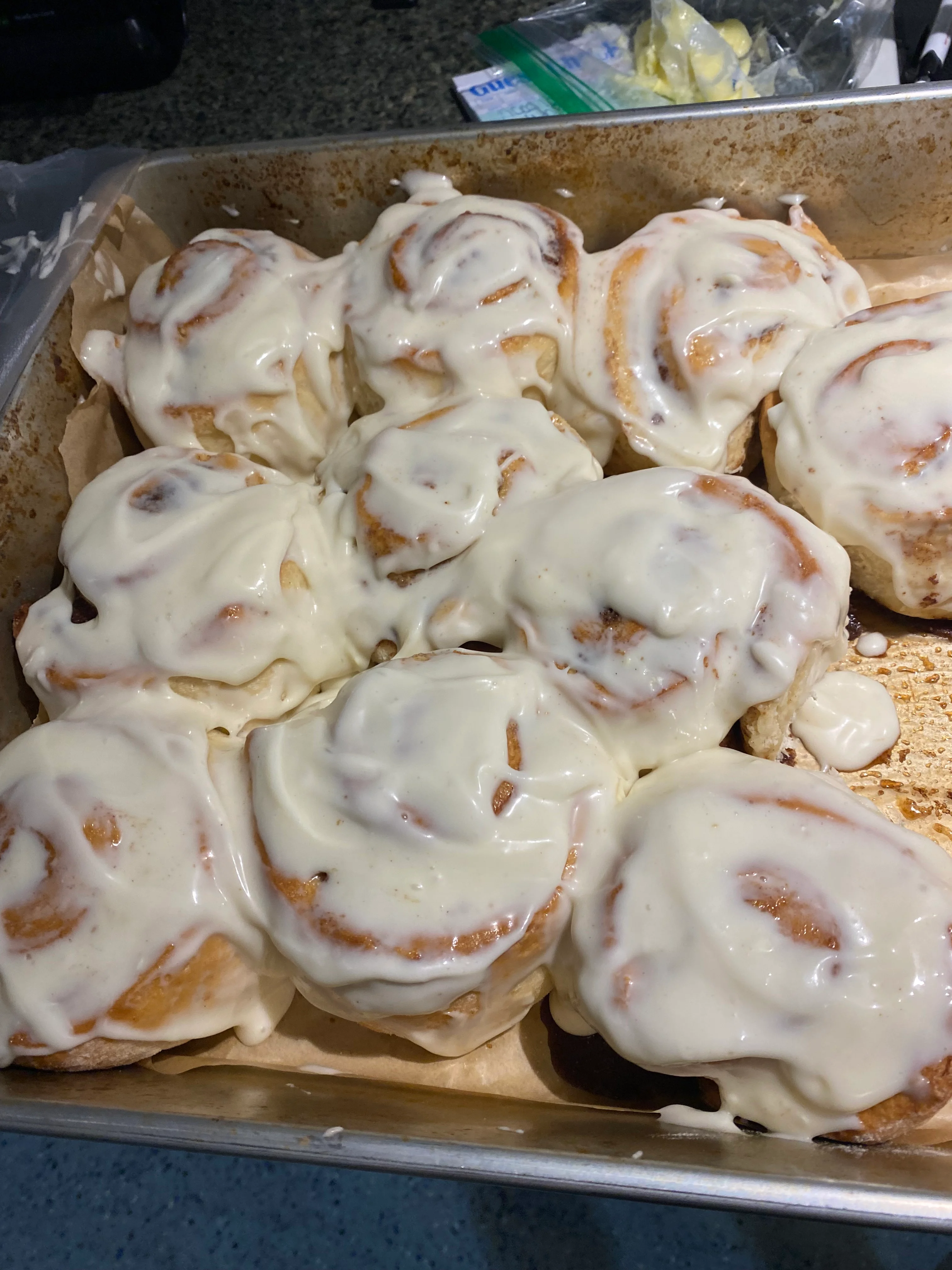 Freshly baked cinnamon rolls with cream cheese frosting