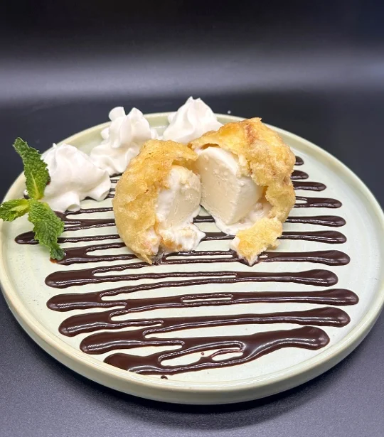  Tempura ice cream dessert with whipped cream and chocolate drizzle at Mahzu East Windsor