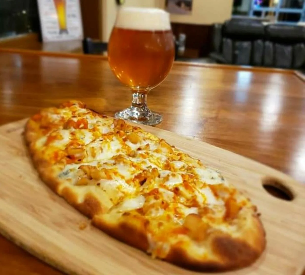 Image of a flatbread and beer