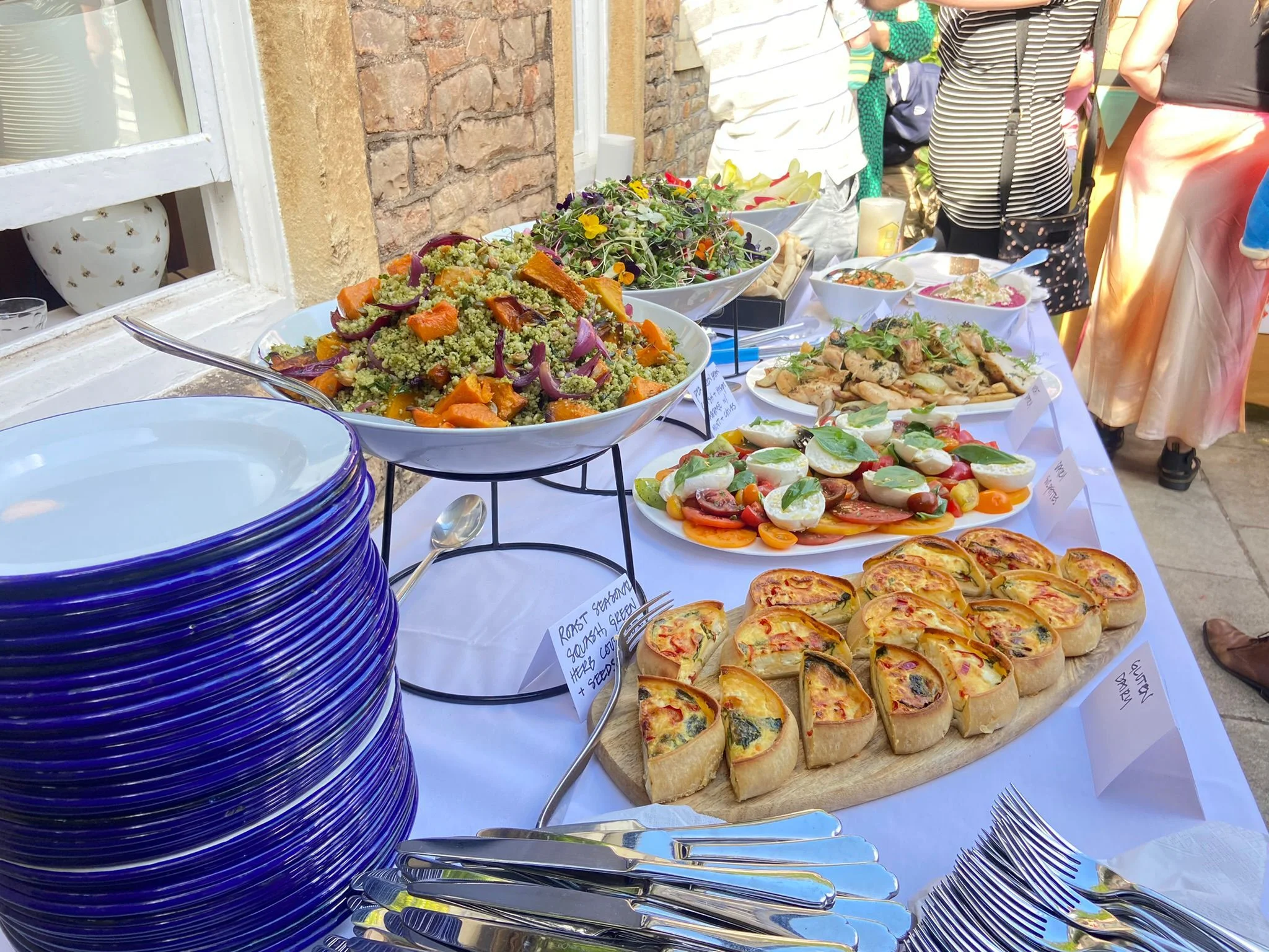Colorful Mediterranean buffet with salads and savory pastries