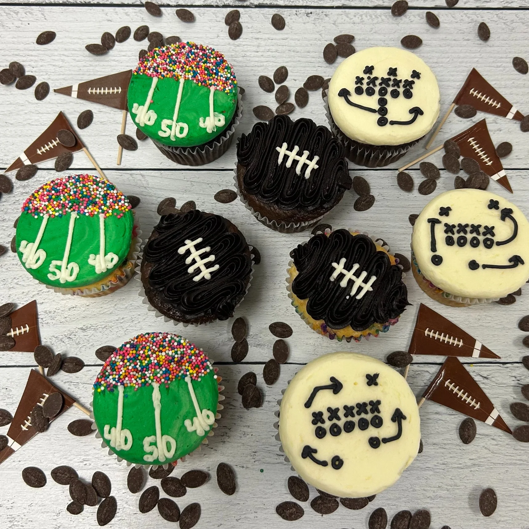 Football-themed cupcakes decorated for a game day celebration