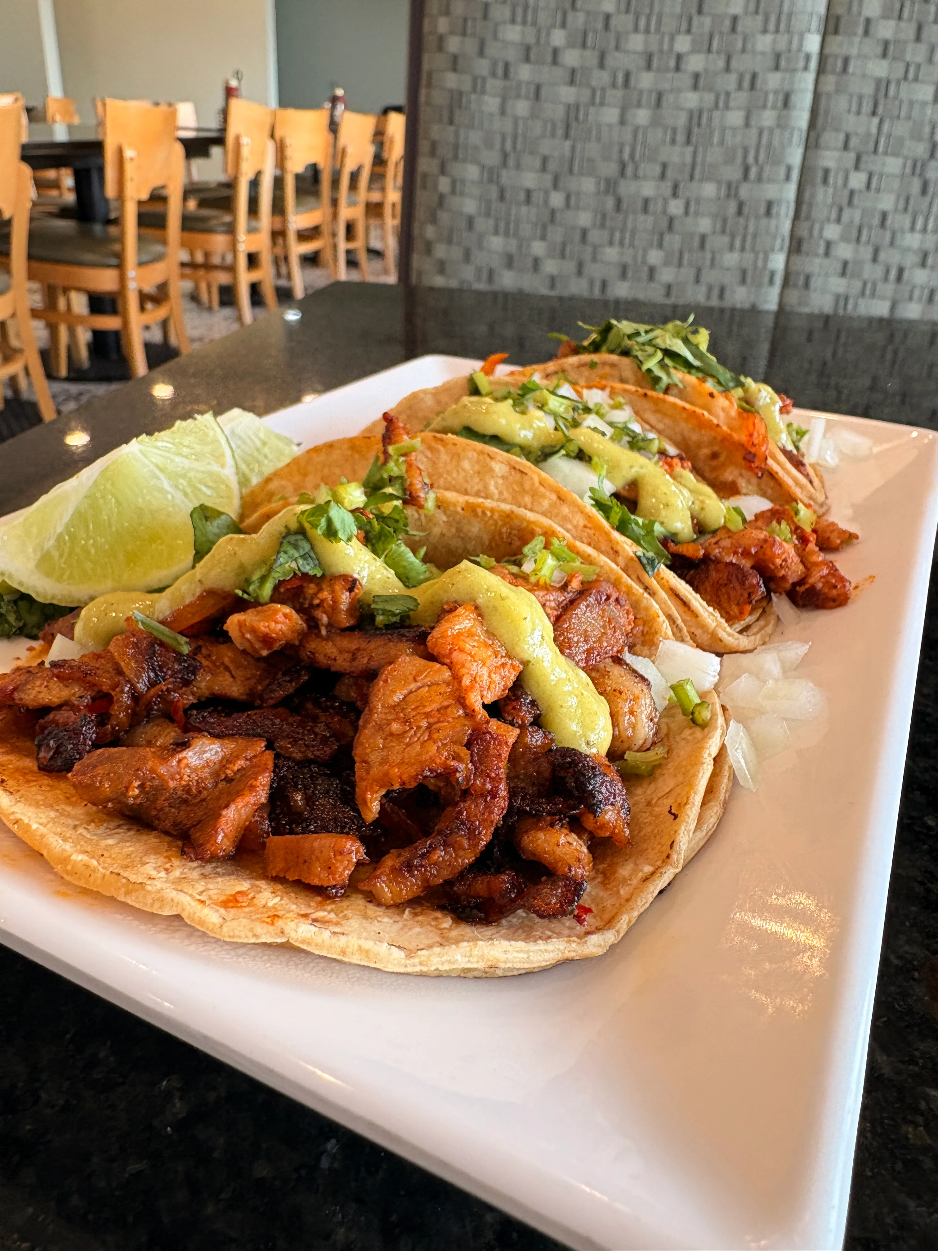Delicious Mexican tacos al pastor with fresh toppings