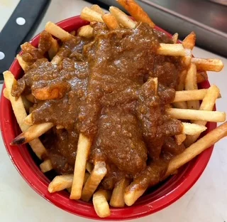 Poutine topped with rich gravy and cheese curds