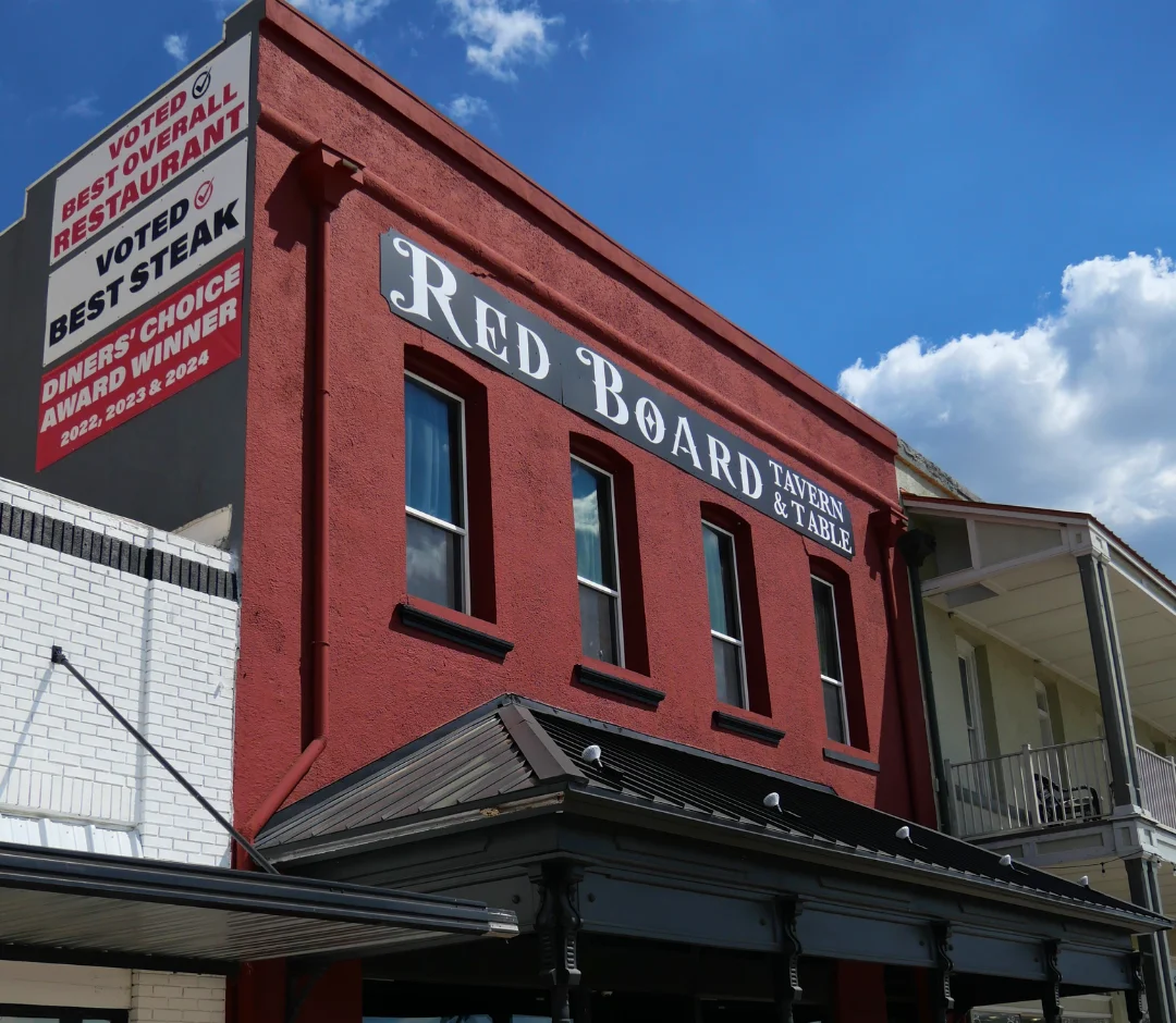 Exterior view of Red Board Tavern & Table with award signage