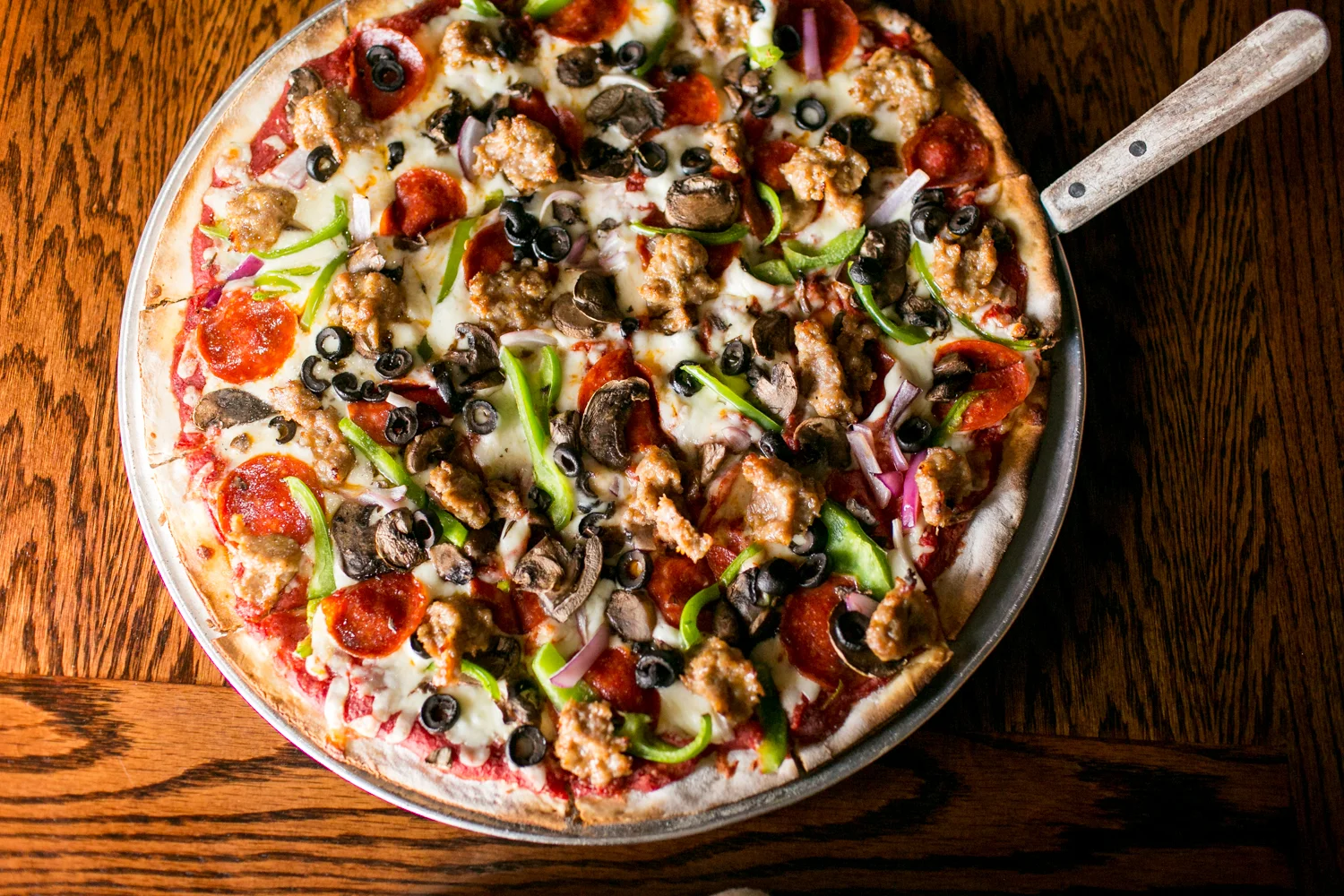 Loaded meat lover's pizza with pepperoni and sausage