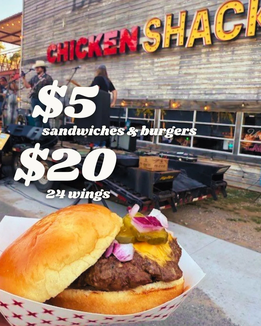 Juicy cheeseburger served at a lively outdoor eatery