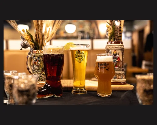 Selection of craft beers in unique glasses on a restaurant table